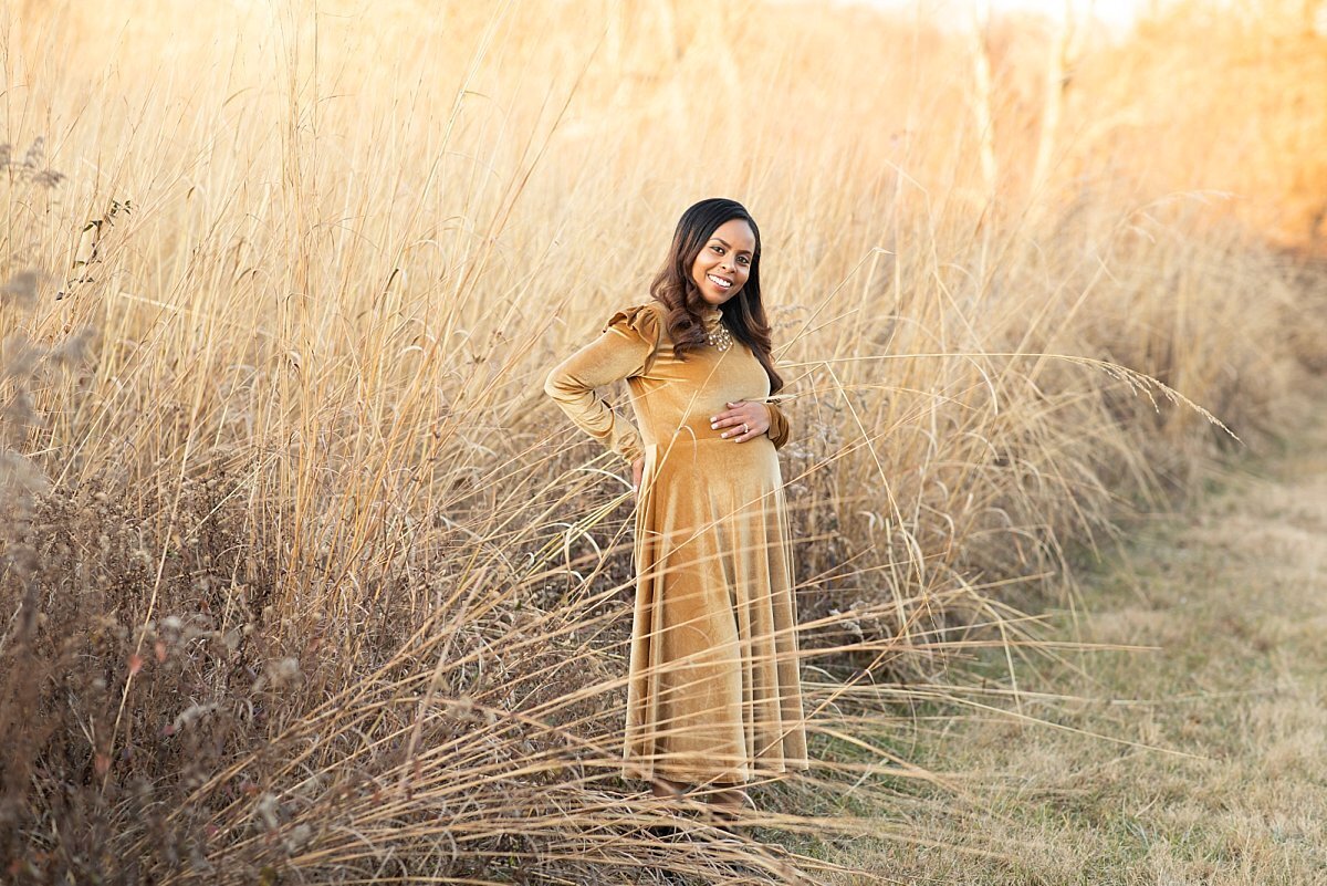 Fall portrait of pregnant woman in a field by Maryland Maternity Photographer : Rebecca Leigh Photography