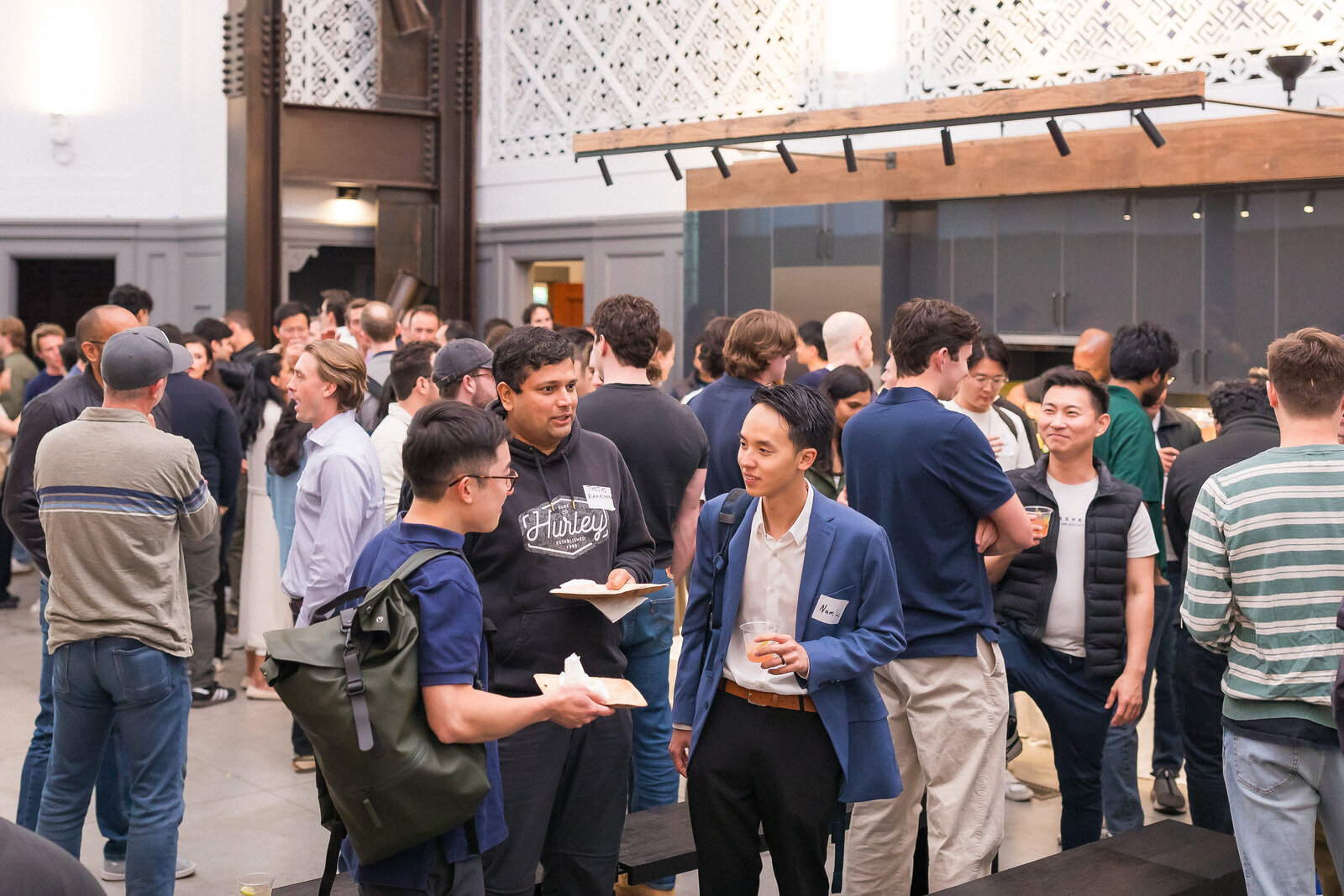Guests in conversation during the Holy Shift event hosted by ACTS 17 Collective in San Francisco.