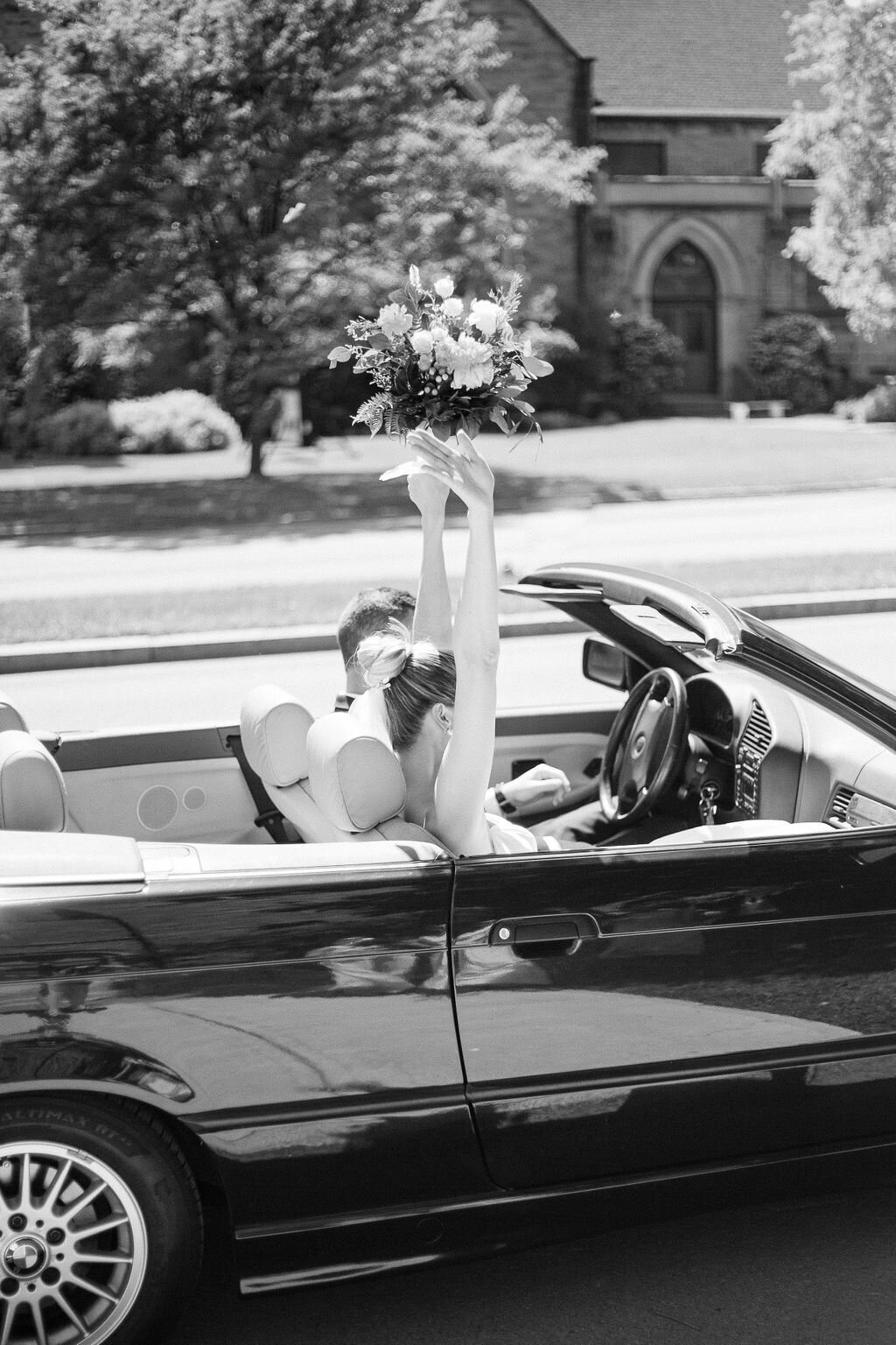 Rochester NY wedding photographer Emi Rose Studio captures candid wedding photos in black and white