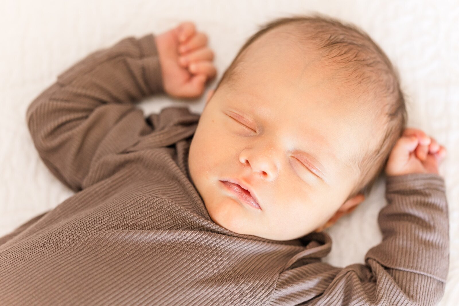 Sleeping baby at a lifestyle newborn session with Erin Thompson Photography