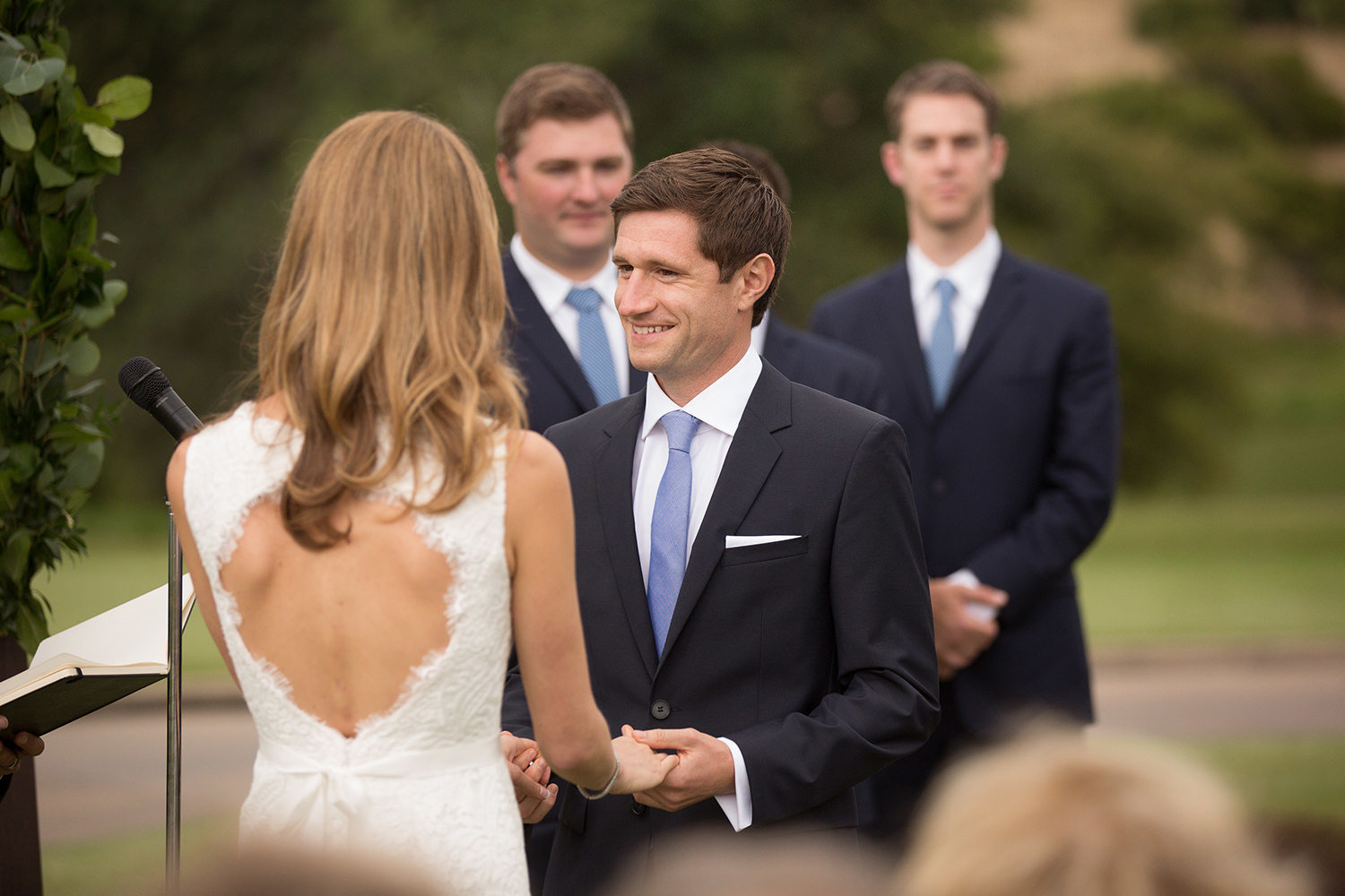saying vows at ceremony