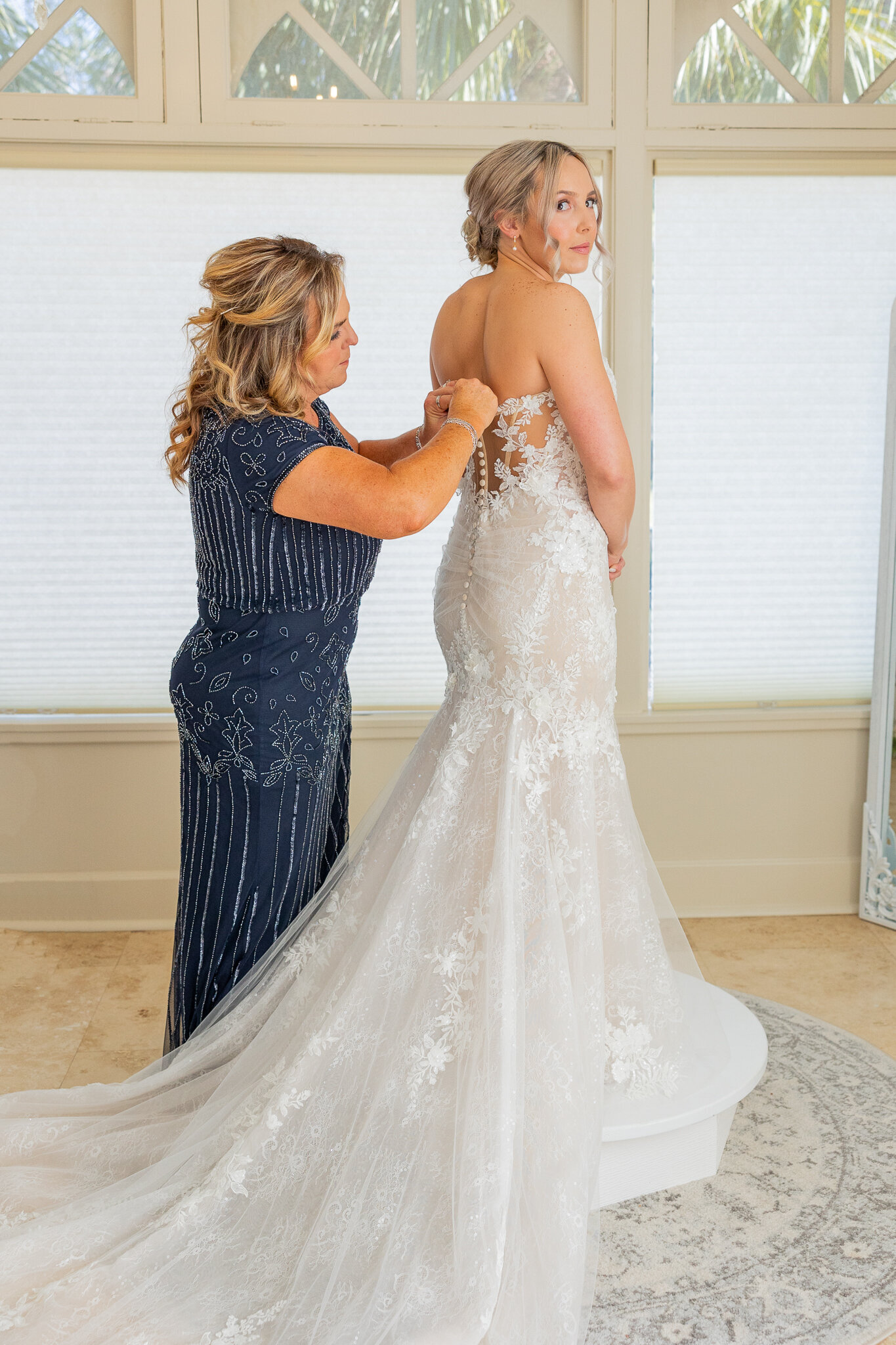 bride looking back with wedding dress
