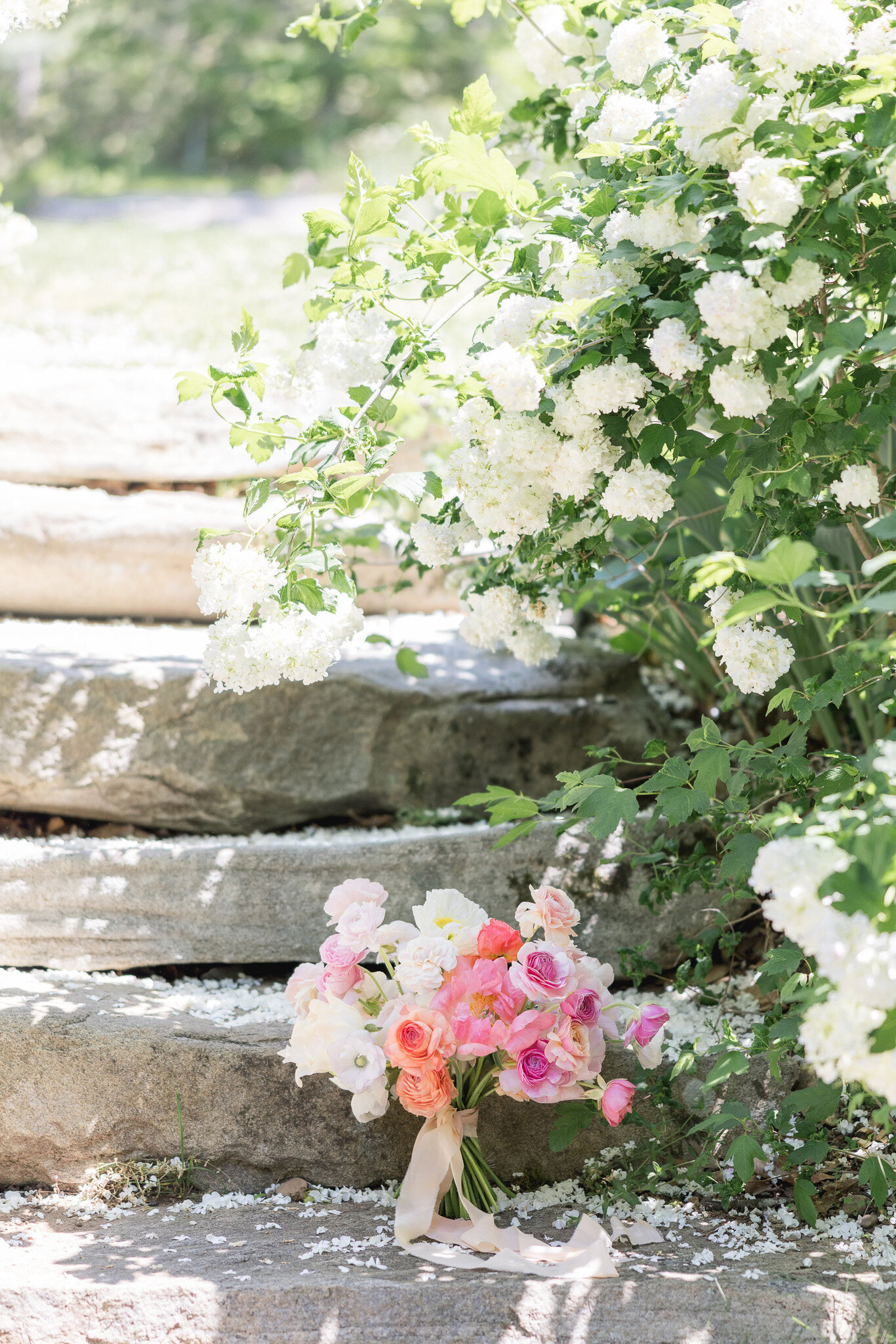 Pink wedding bouquet with spring flowers