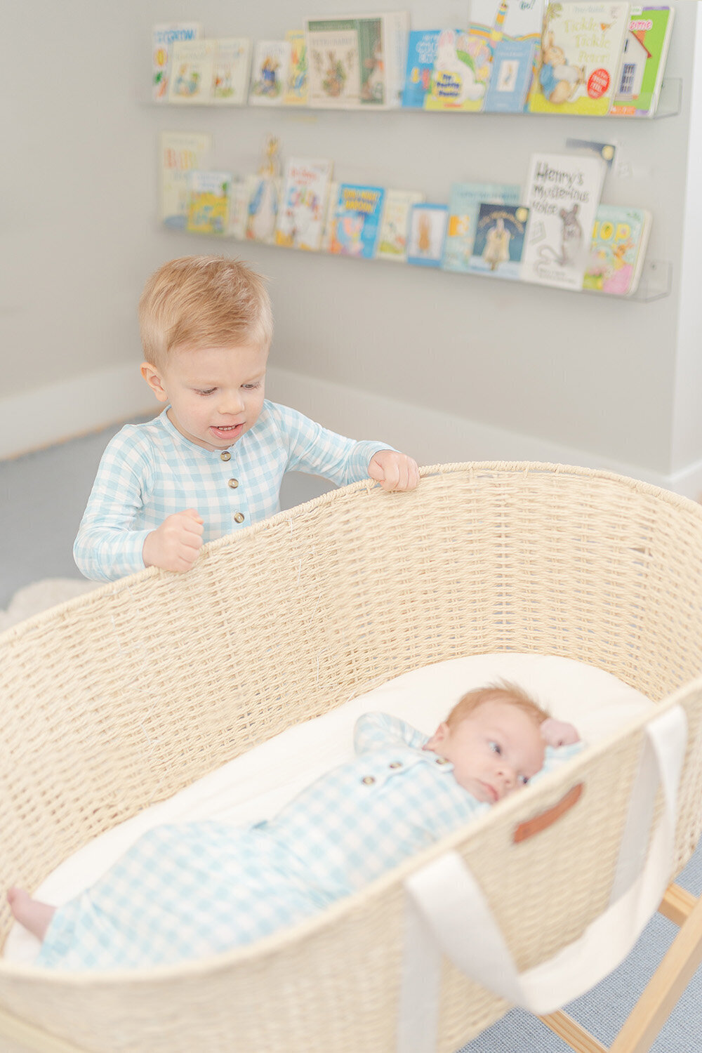 big brother adore sibling during Fairfax County, VA newborn session