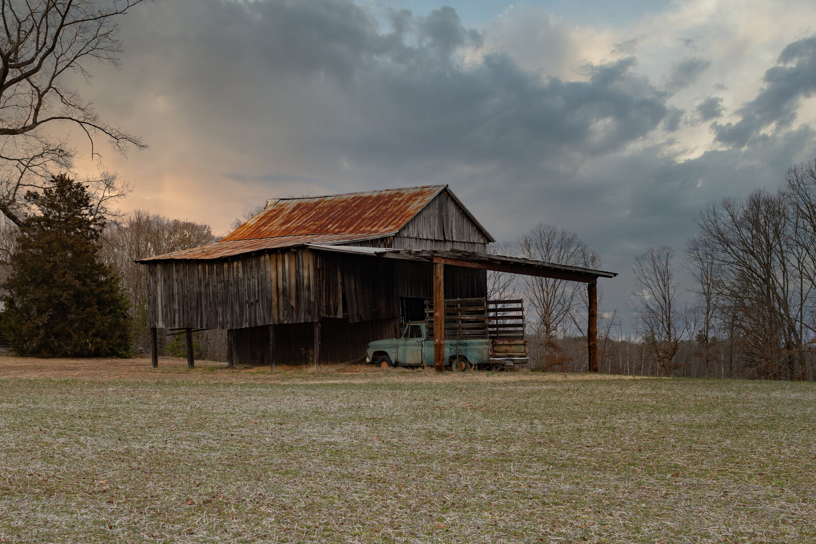 old barn with antique truck