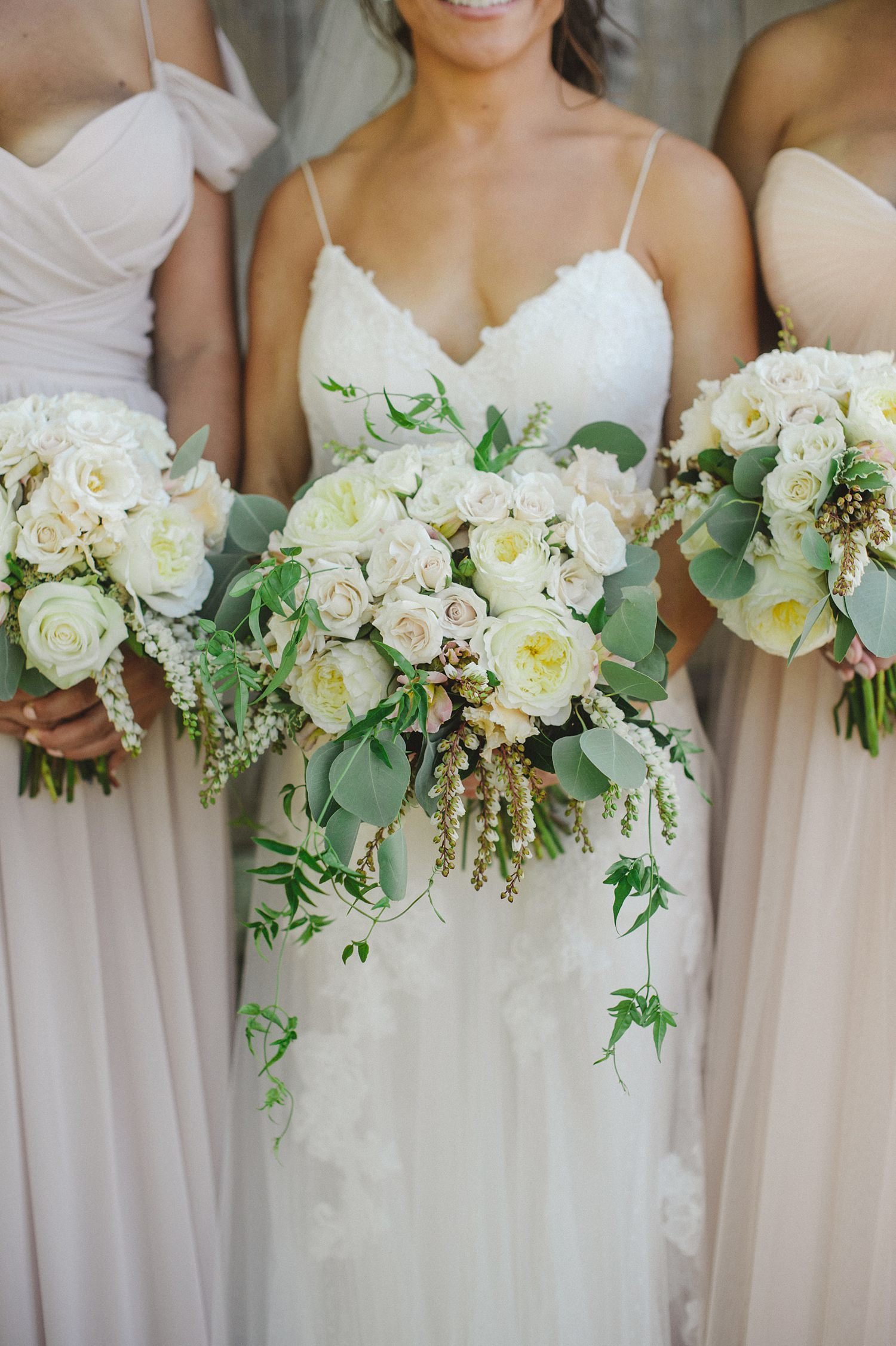 Rustic wedding bouquets in green, blush and ivory at The Webb Barn in Wethersfield, CT