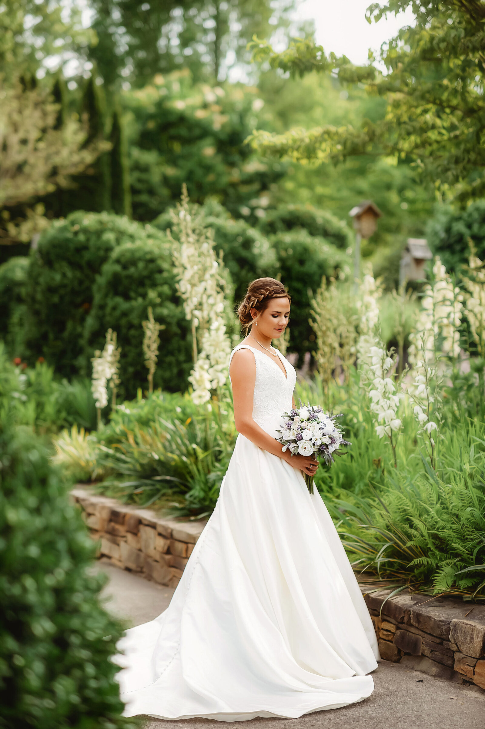 Bride poses for Bridal Portraits at The NC Arboretum in Asheville, NC.