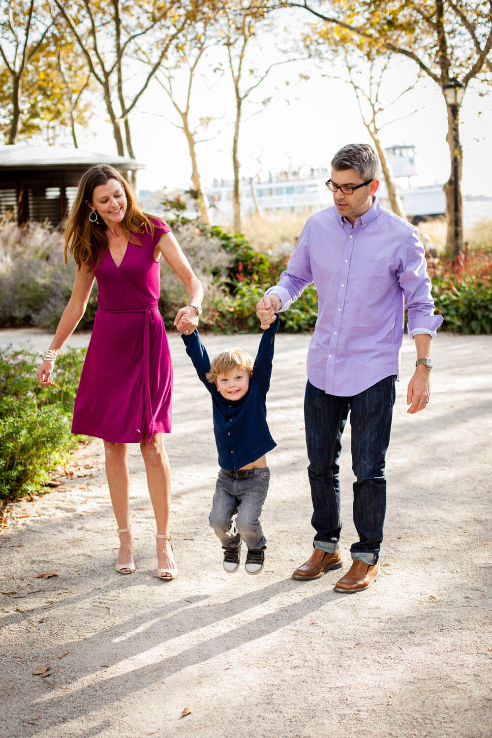 A family walking together in Battery Park for photography