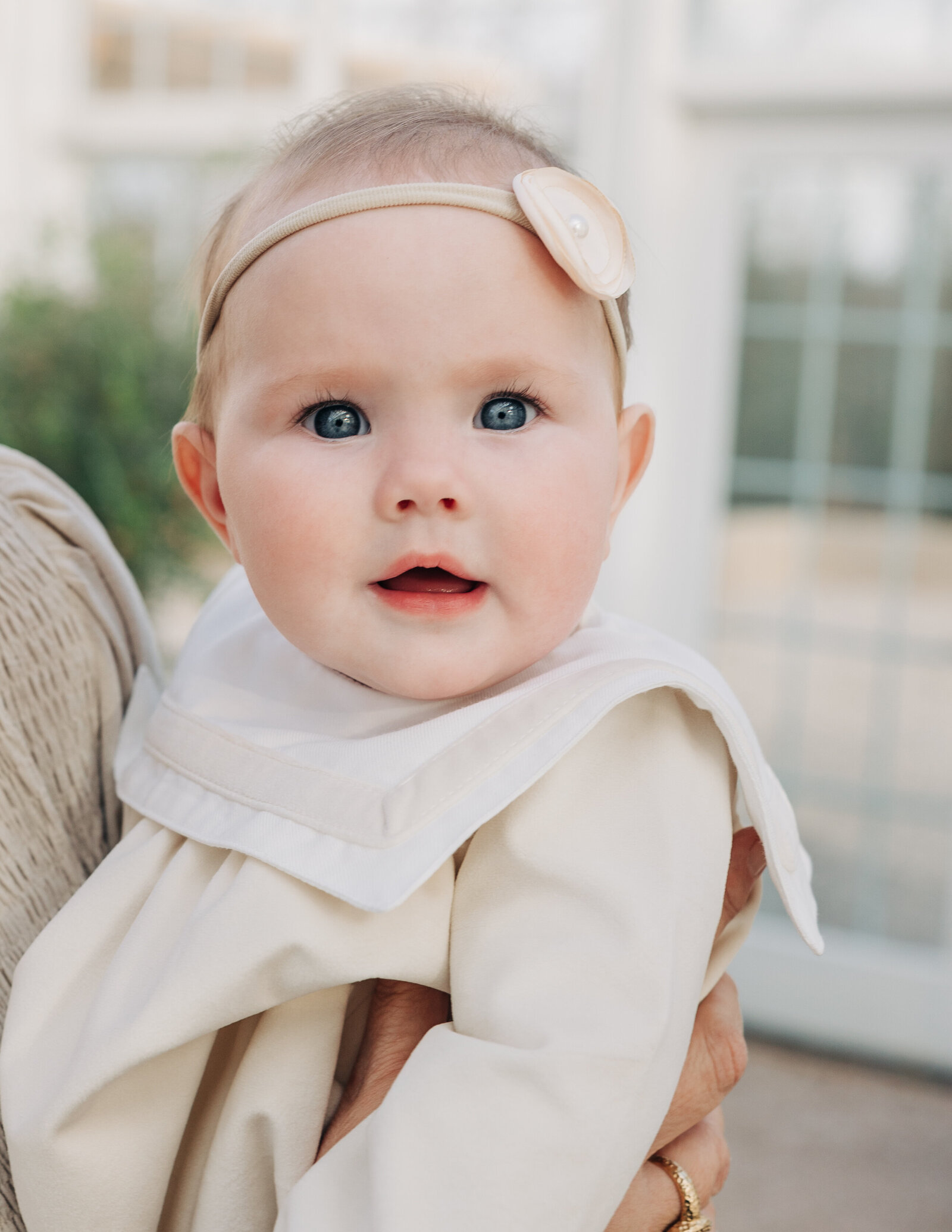 Baby-looking-at-camera-Fleurish-Greenhouse