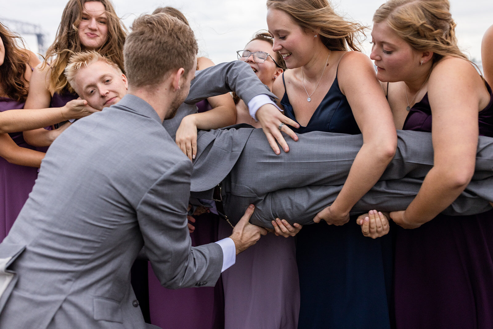 Laid back and fun wedding party photos along the shore in Duluth-mn