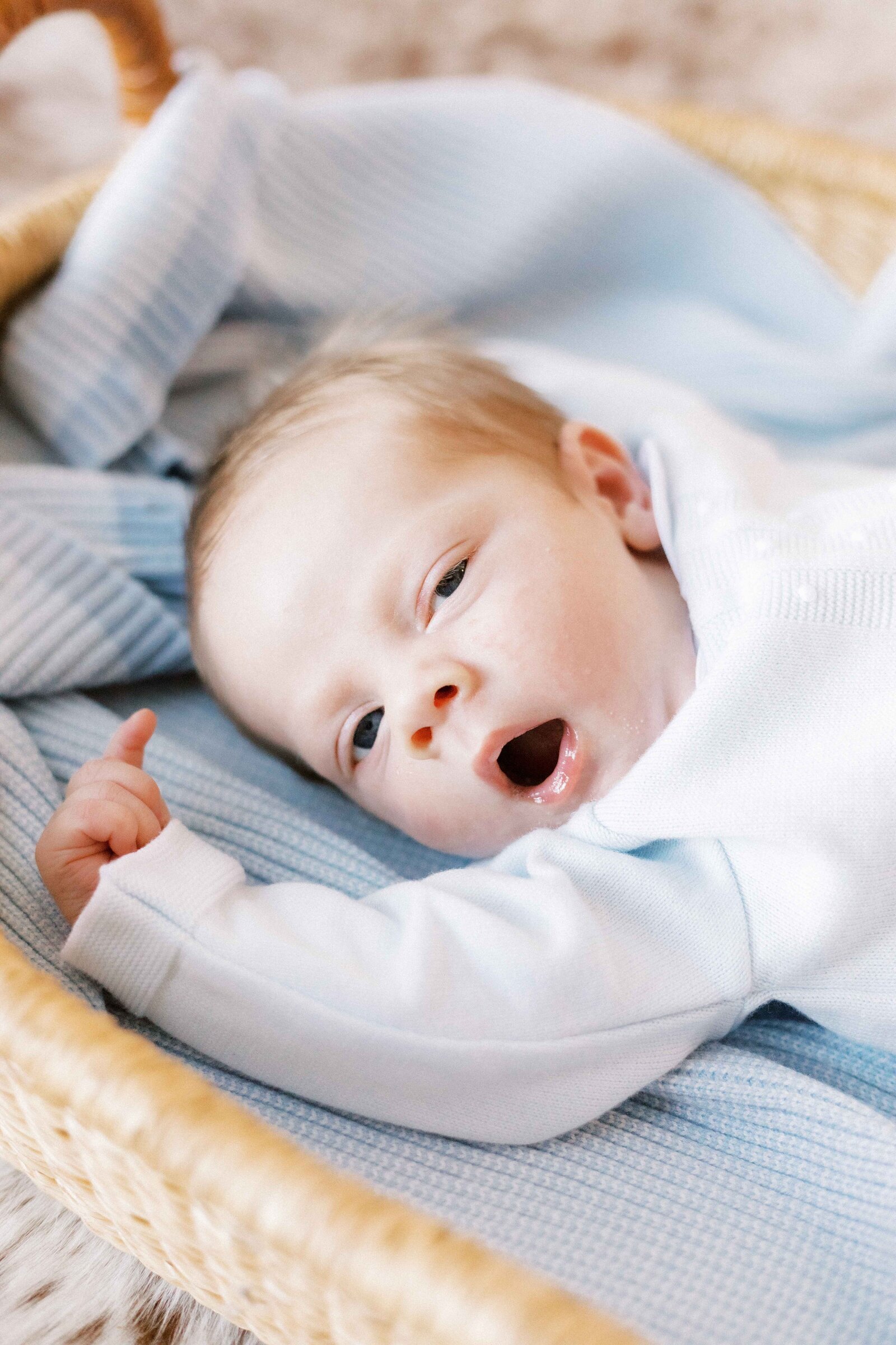 baby yawning in newborn photos in peoria illinois 