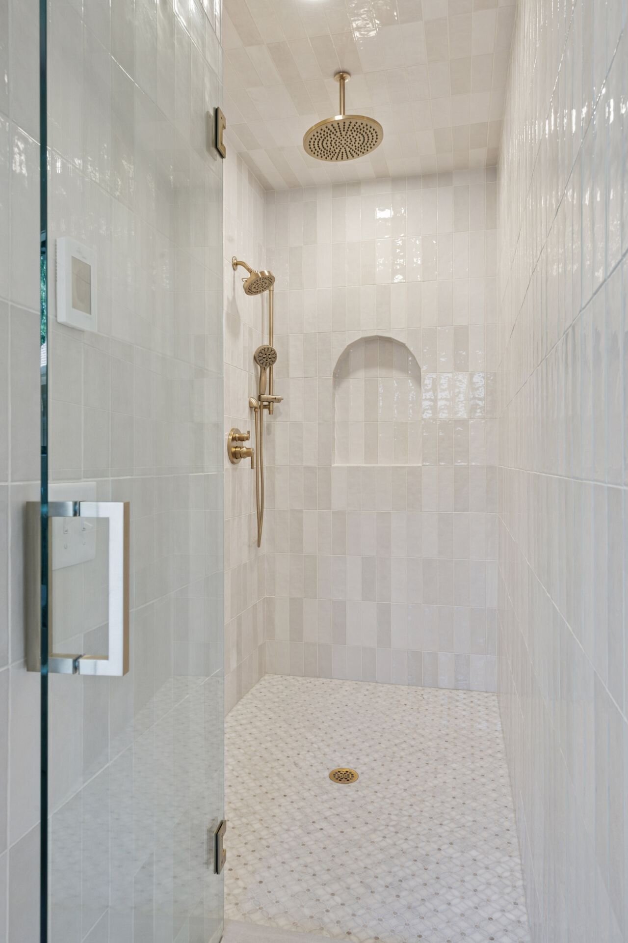 4404 West 58th Street - Primary Suite Walk in Serenty Shower with Custom Tilework & Designer Arched Alcove