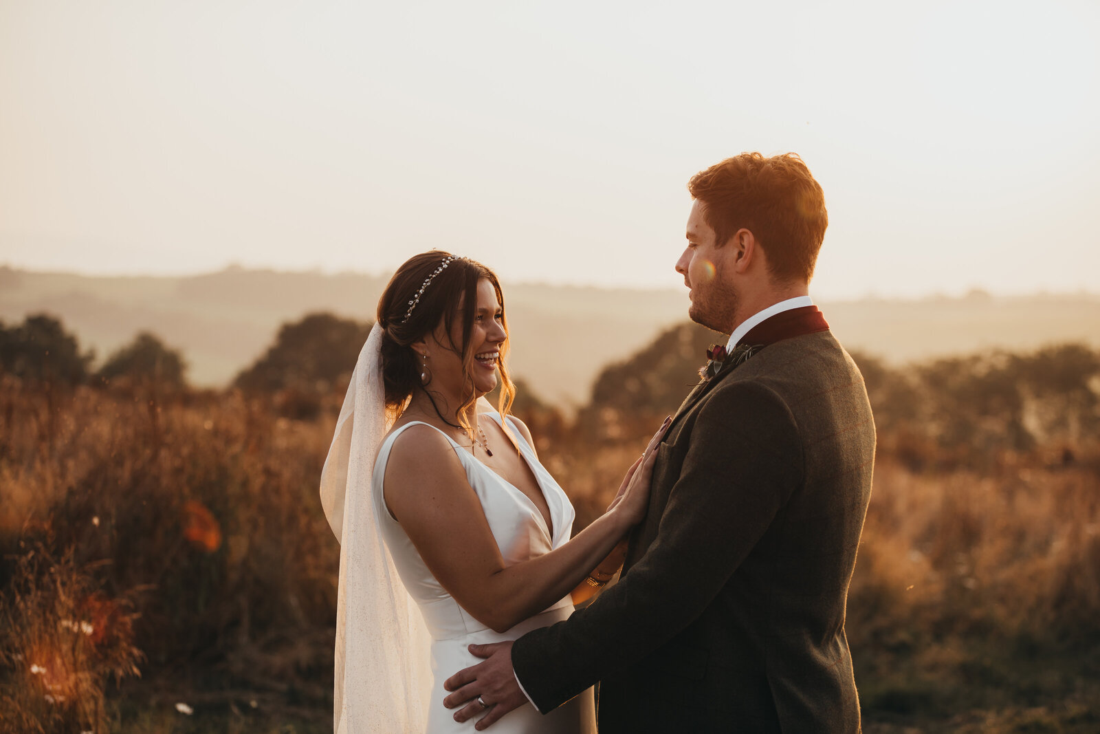 married couple at sunset