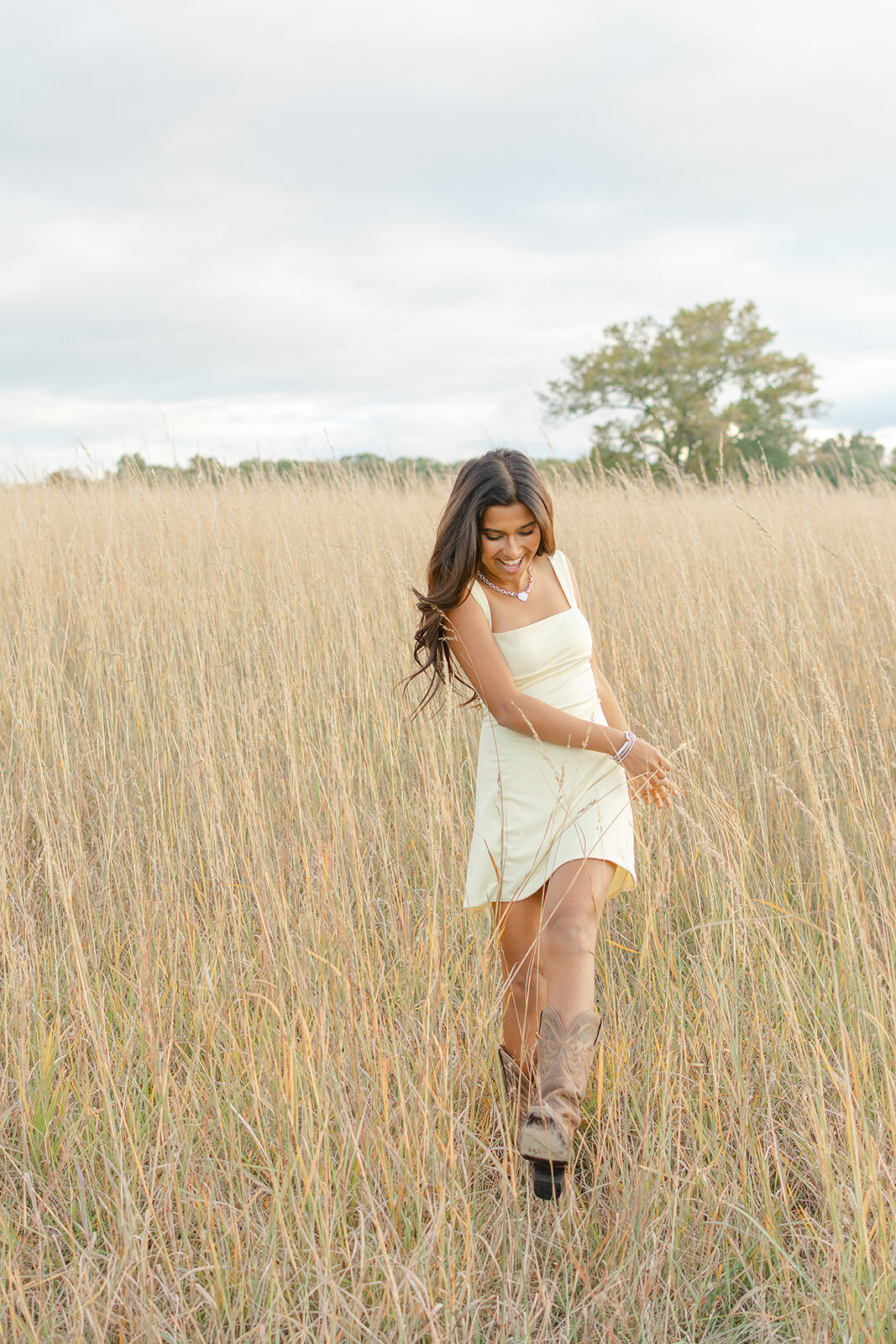 girl playing in grass taken in Centreville, VA