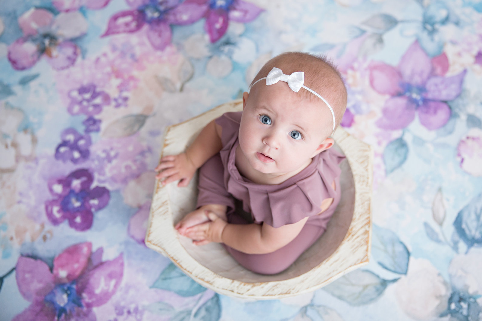 baby girl purple floral background