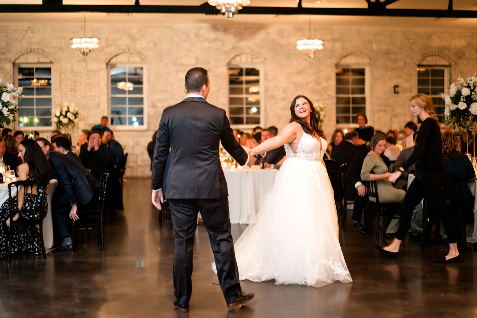 Bride and groom share their first dance at their indoor wedding reception at Grbic Events in St. Louis.