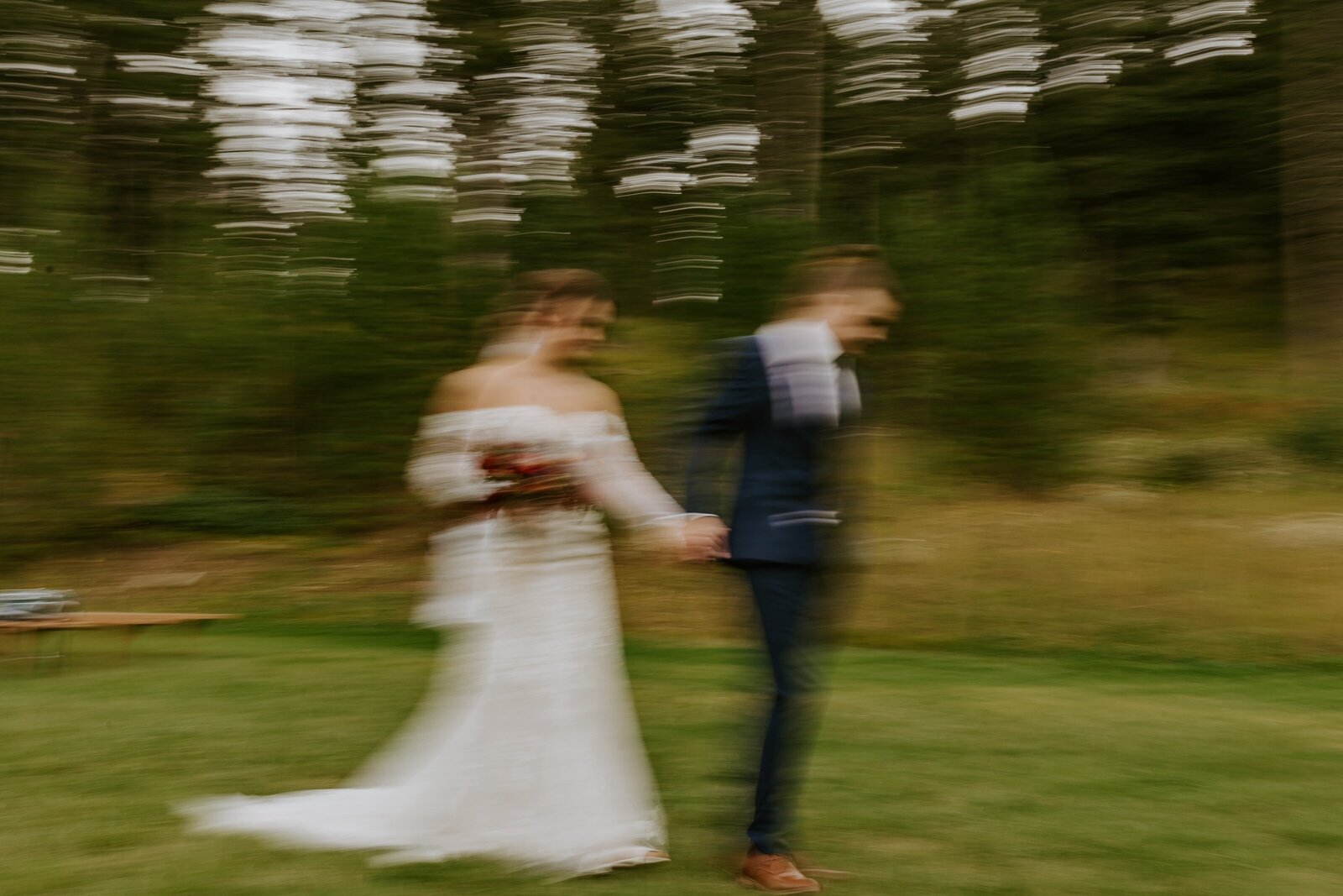A blurred stylized shot of a wedding couple.