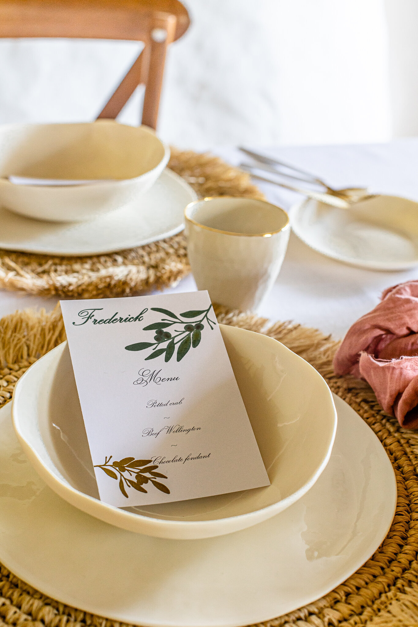 Combined place card and menu with embossed and painted olives