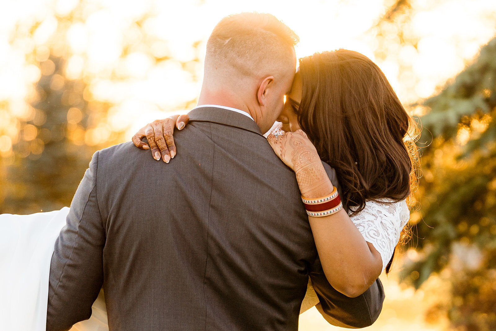 Sunset pic.  Groom carrying pride