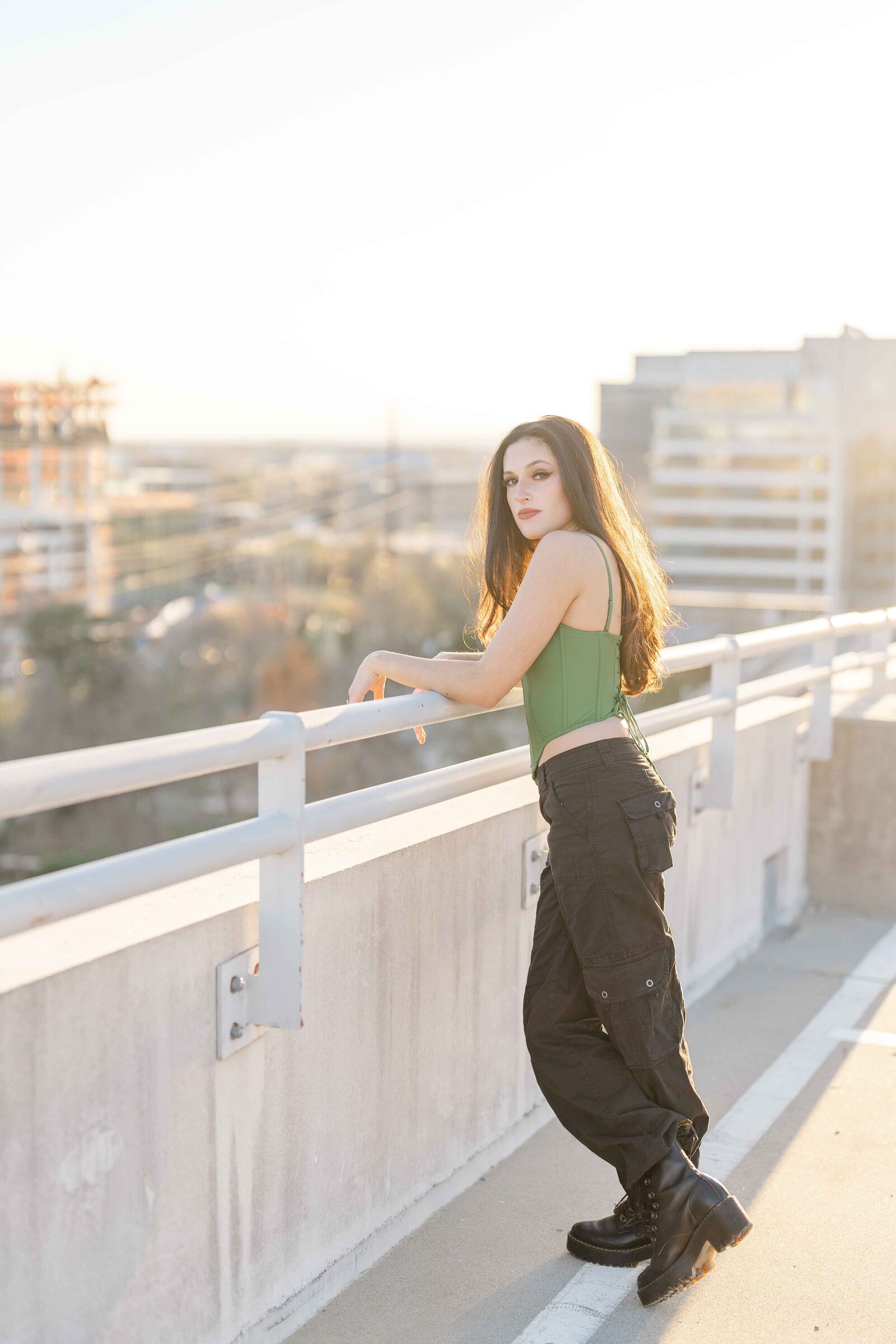 girl standing by the railing during Fairfax County, Virginia senior picture