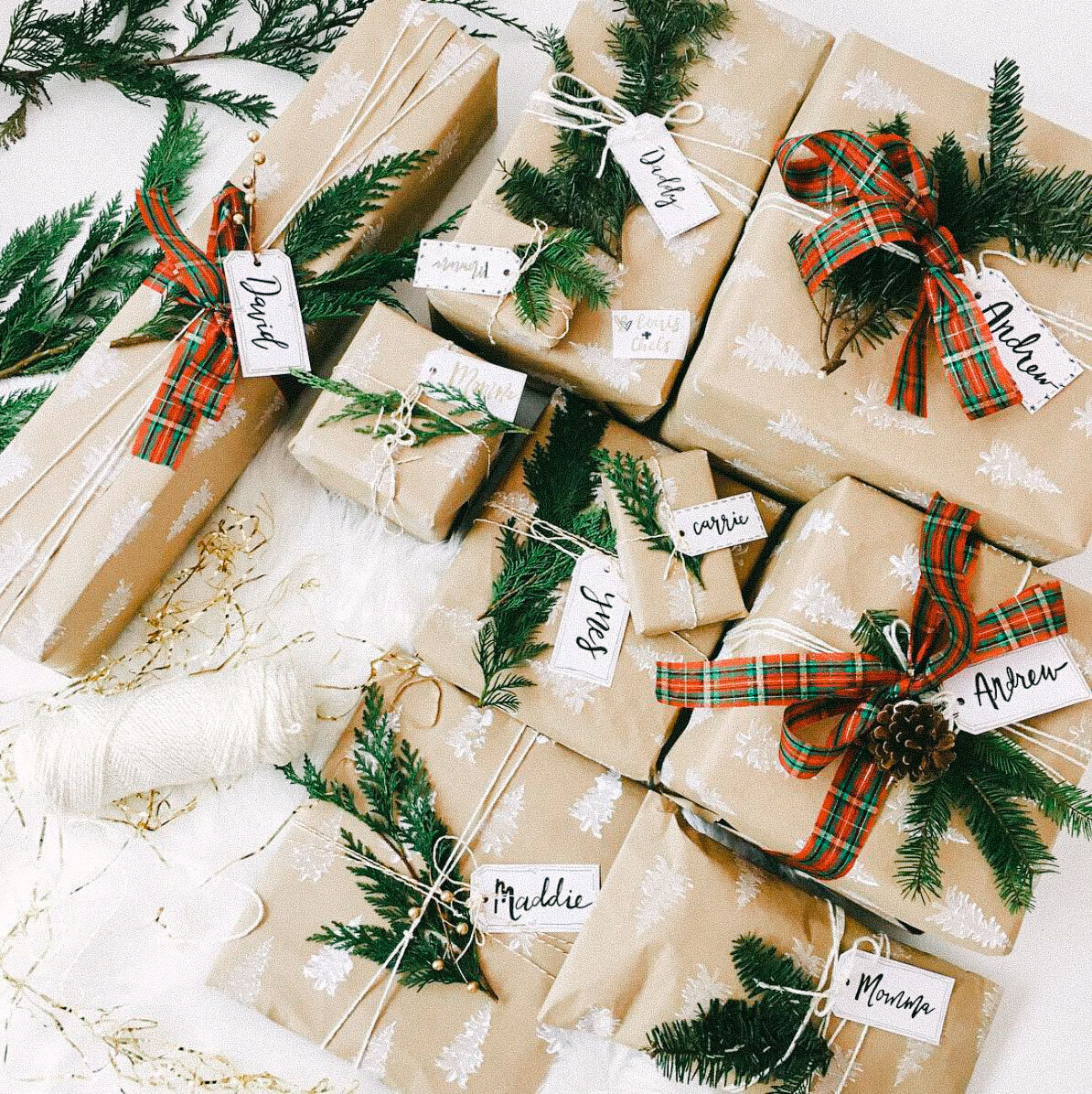 DIY brown butcher paper stamp  white Christmas tree ribbon Scandinavian wrapping paper gifts Chelsea Loren gift wrapping ideas