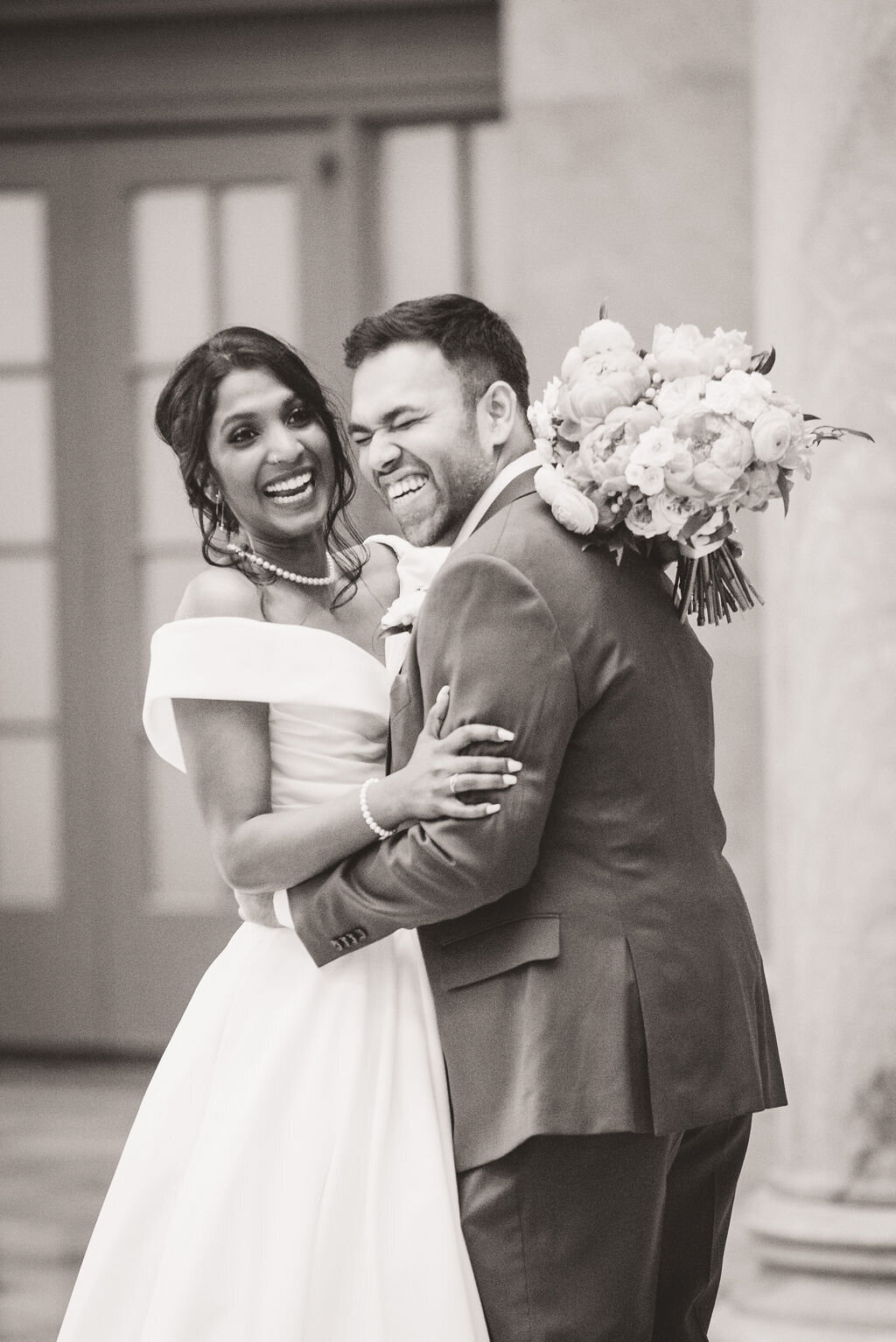 bride-groom-laughing-portrait-bouquet