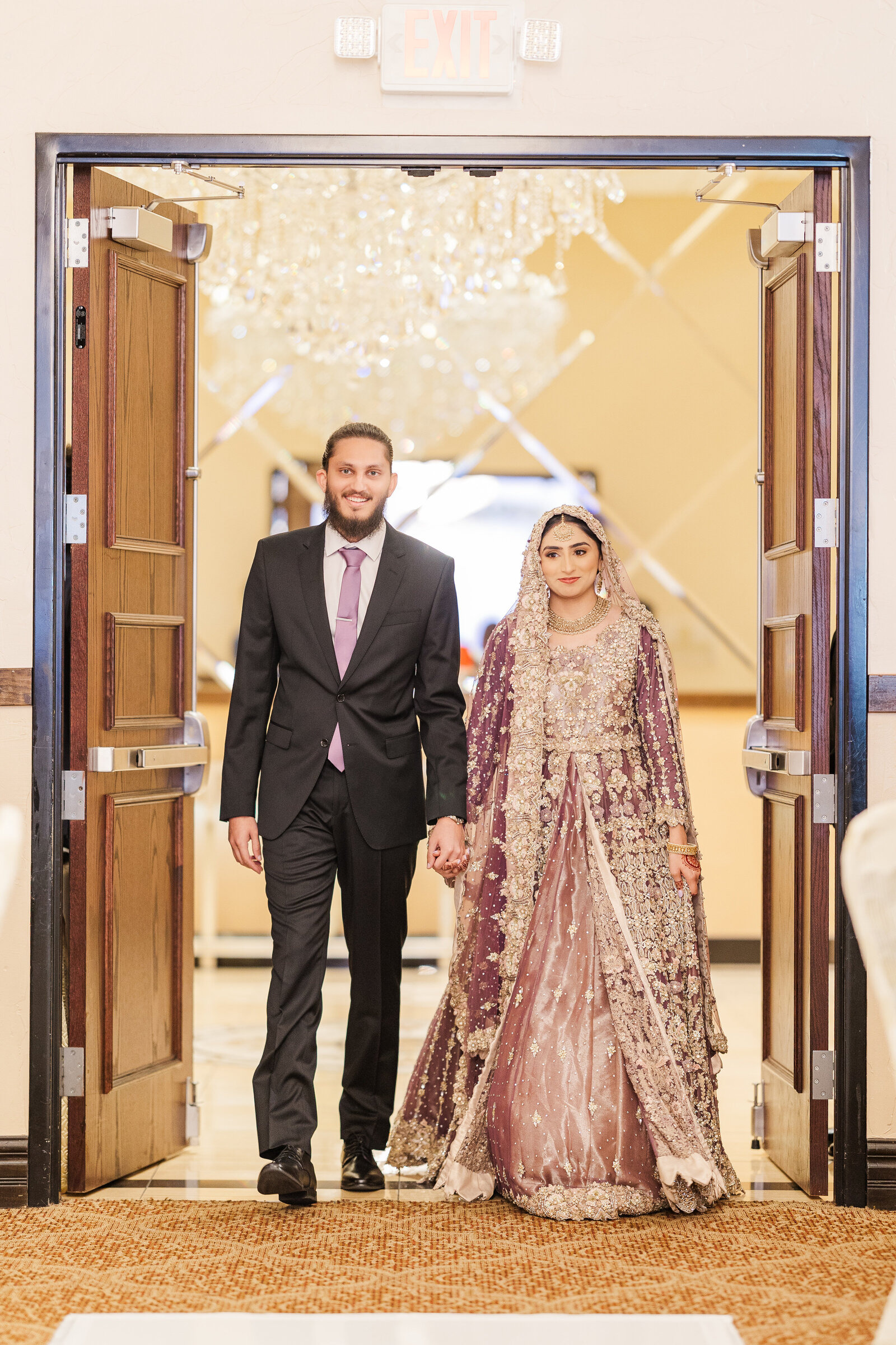 Bride-and-groom-wedding-hall-entry