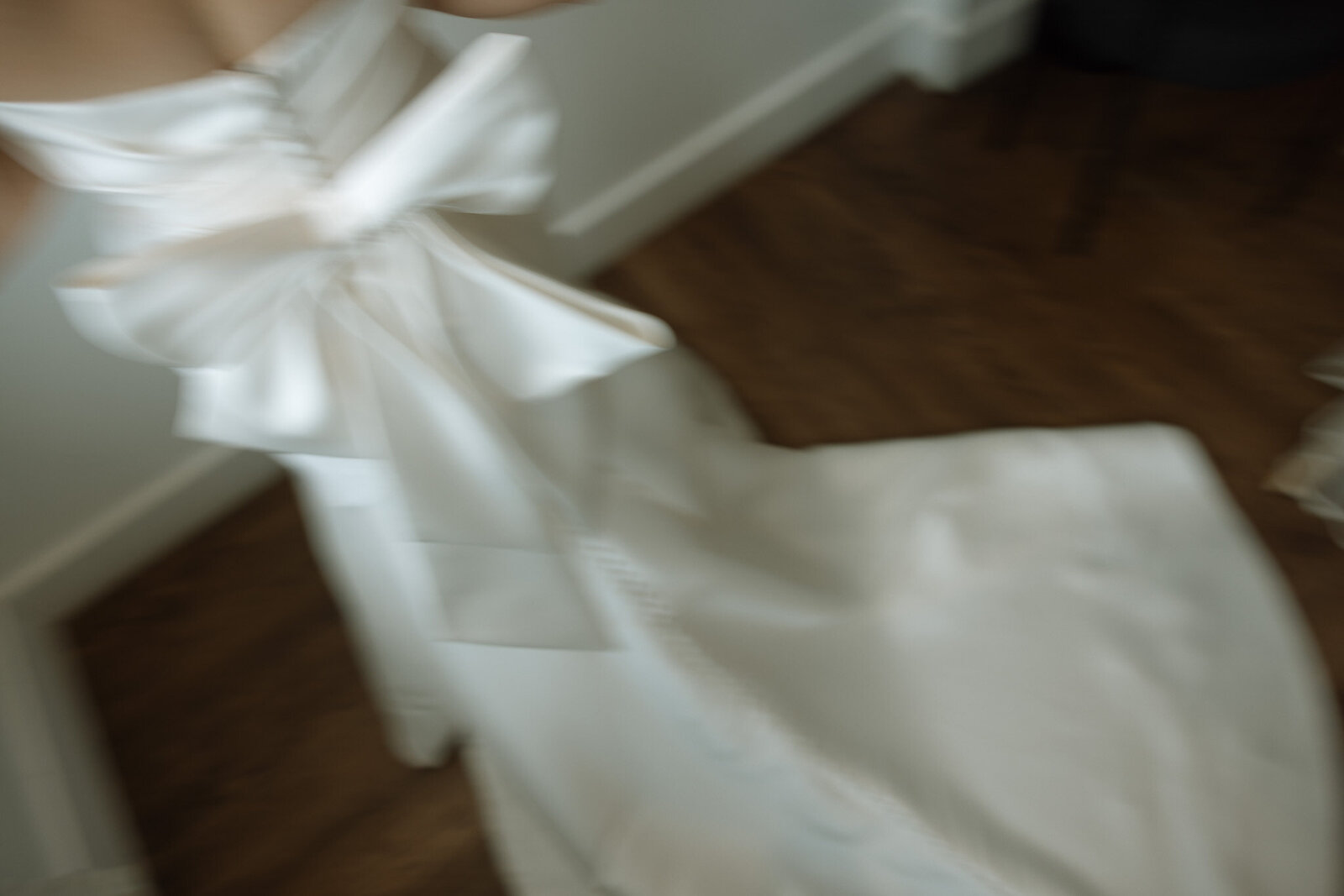 Bride stands in the light for a blurry photo at 14Tenn in Nashville, TN.