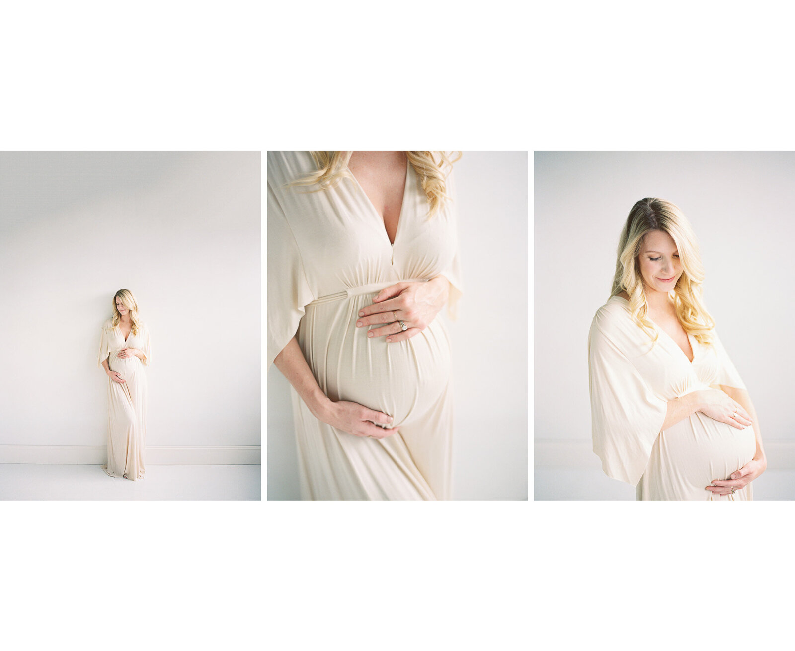 Woman in long cream dress holding pregnant belly by Milwaukee Maternity Photographer