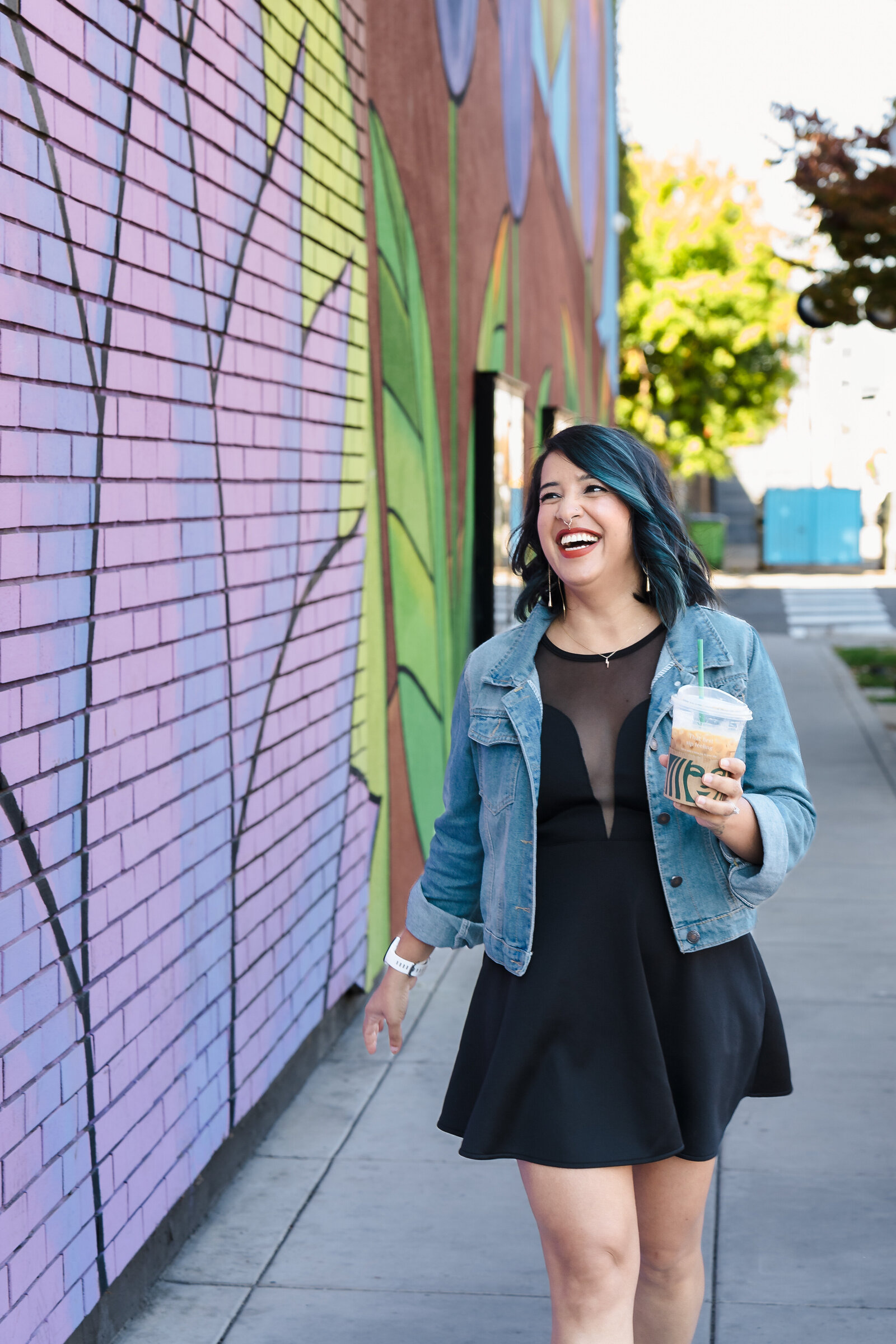 Business Coach walking on the street, holding a cup of coffee