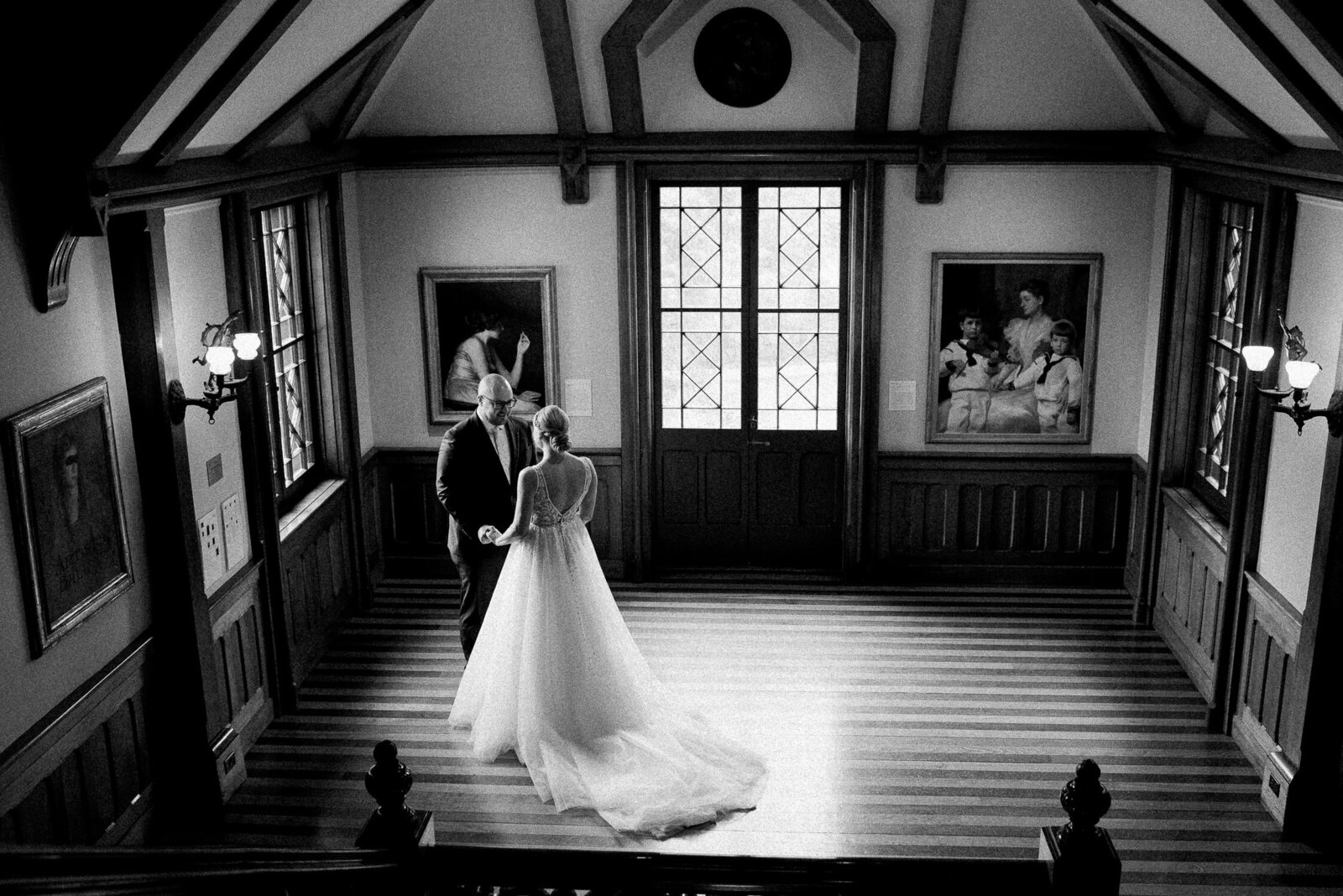 dramatic first look moment in historic Newport building