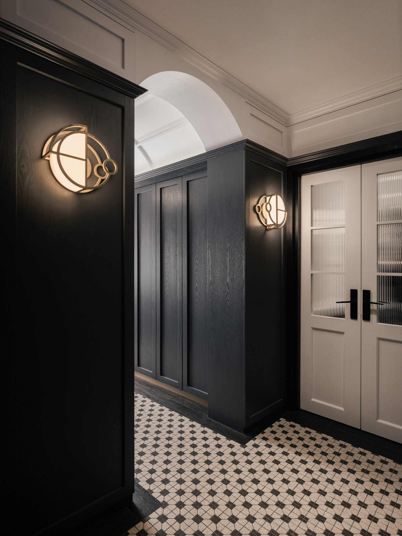 Hallway with white french doors