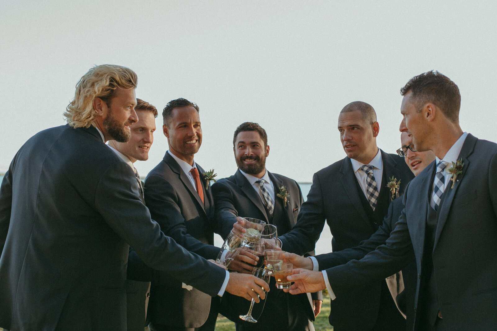 groomsmen cheers before wedding