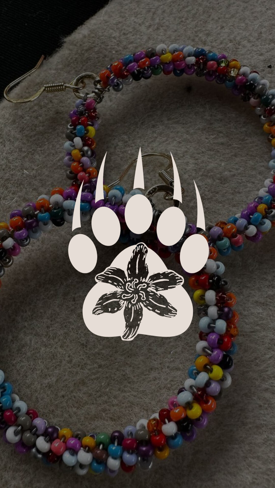 bear paw indigenous with lily flower inside