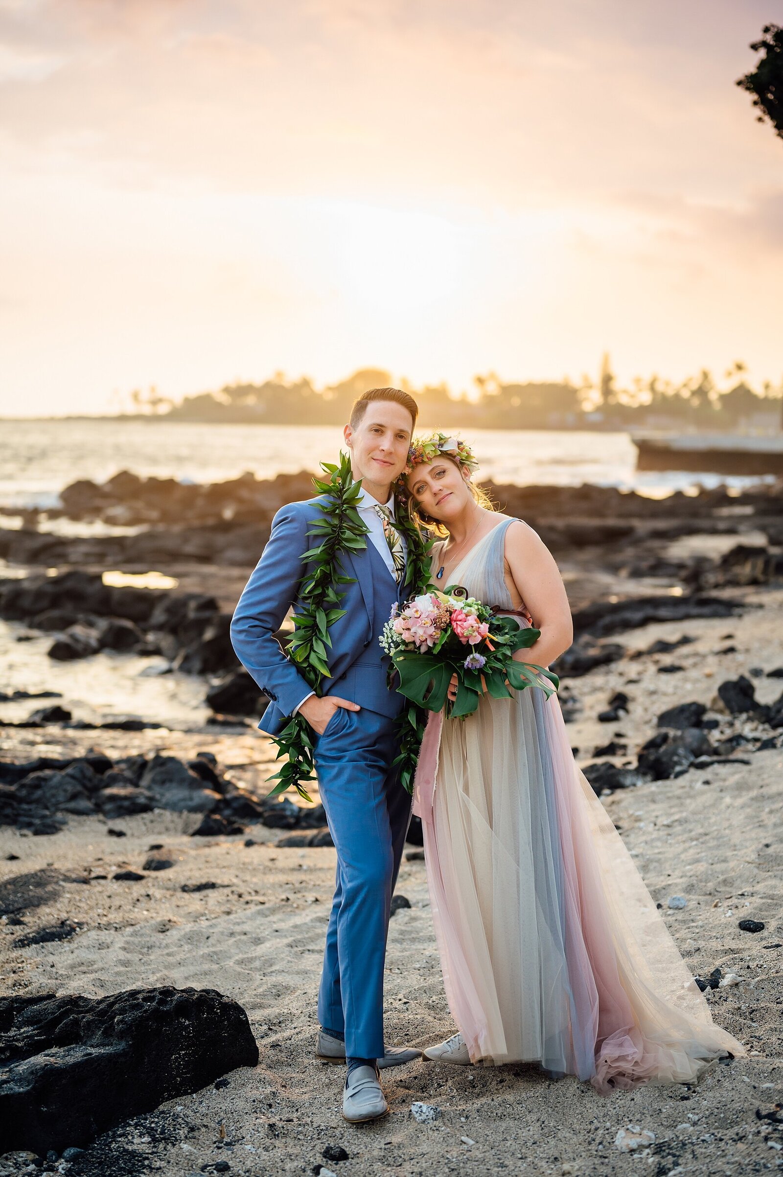 bride and groom smiling on their wedding day in Kona