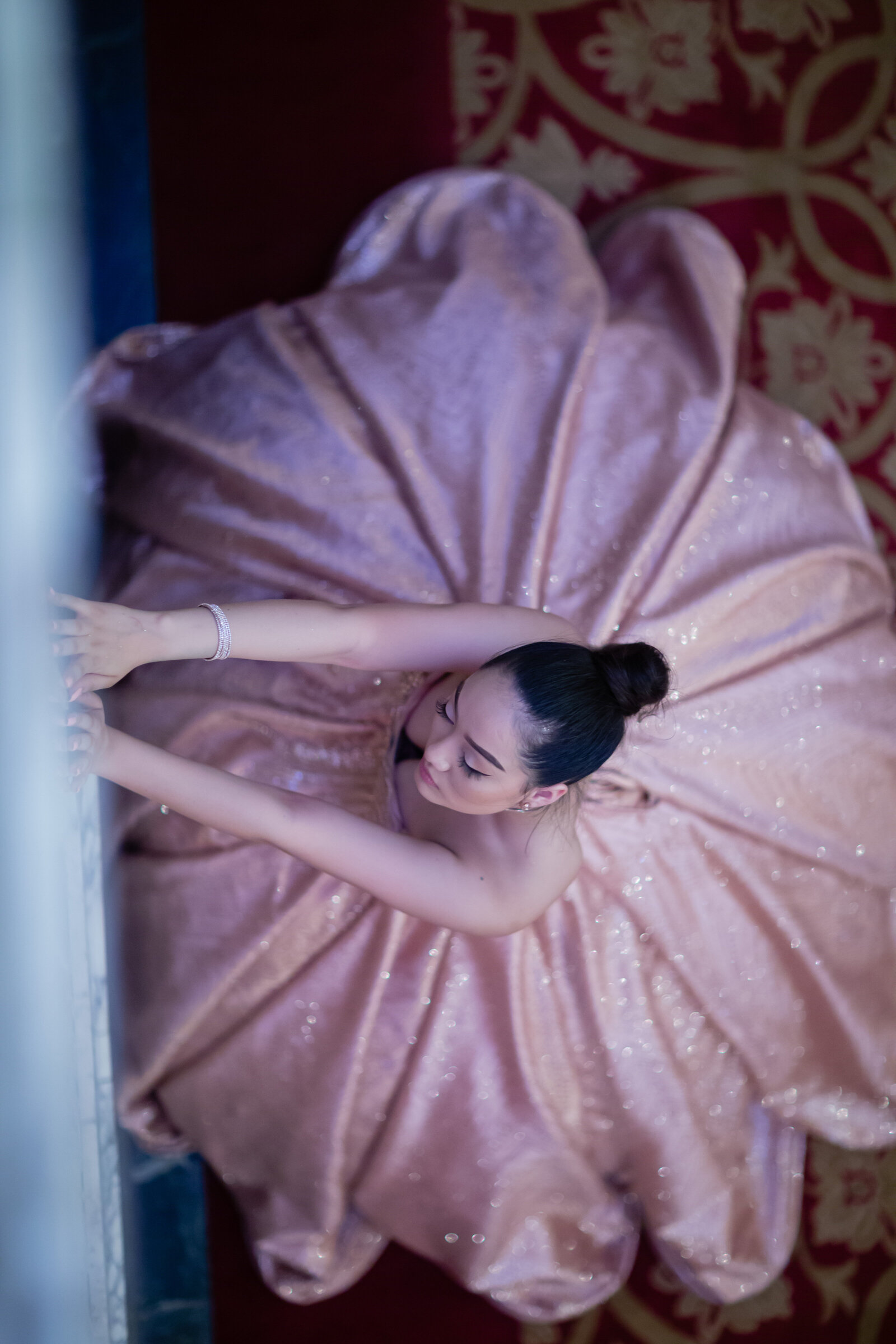 An elegant overhead view of a quinceañera gown in the majestic Ohio Theater at Playhouse Square, Cleveland, Ohio. Capturing timeless beauty with TheWiz Photography.