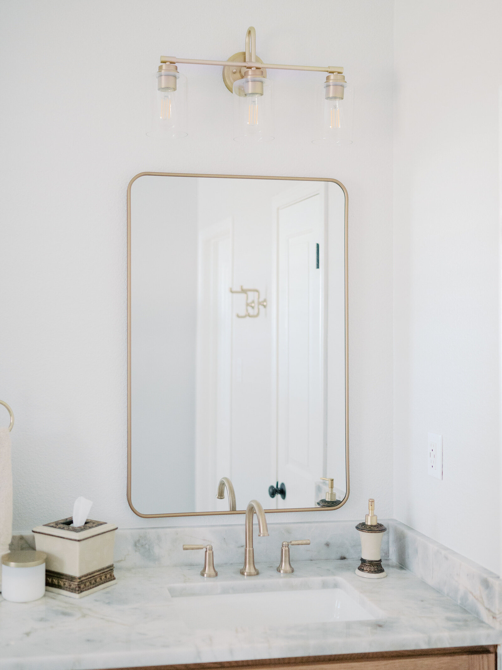 Vanity with gold accents