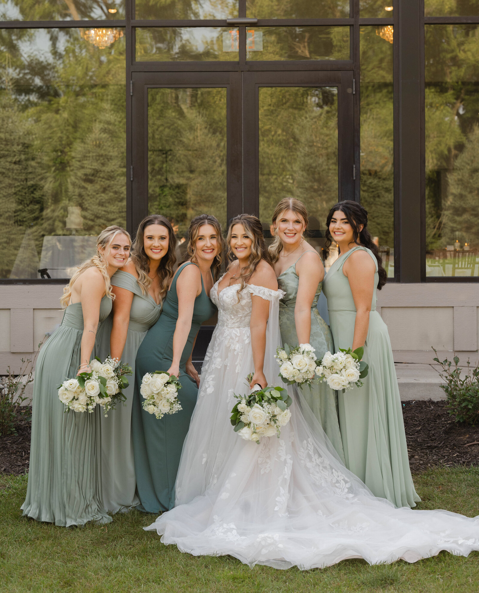 bride and bridesmaids in green at Venue3Two