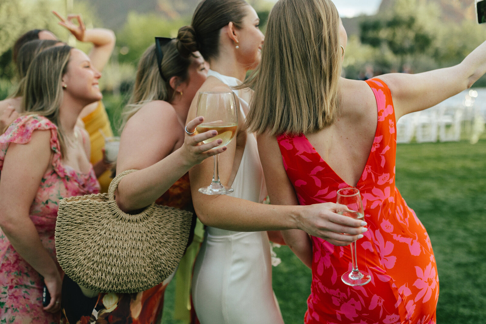 scottsdale-wedding-florist-bride-champagne-toast-selfie-guests