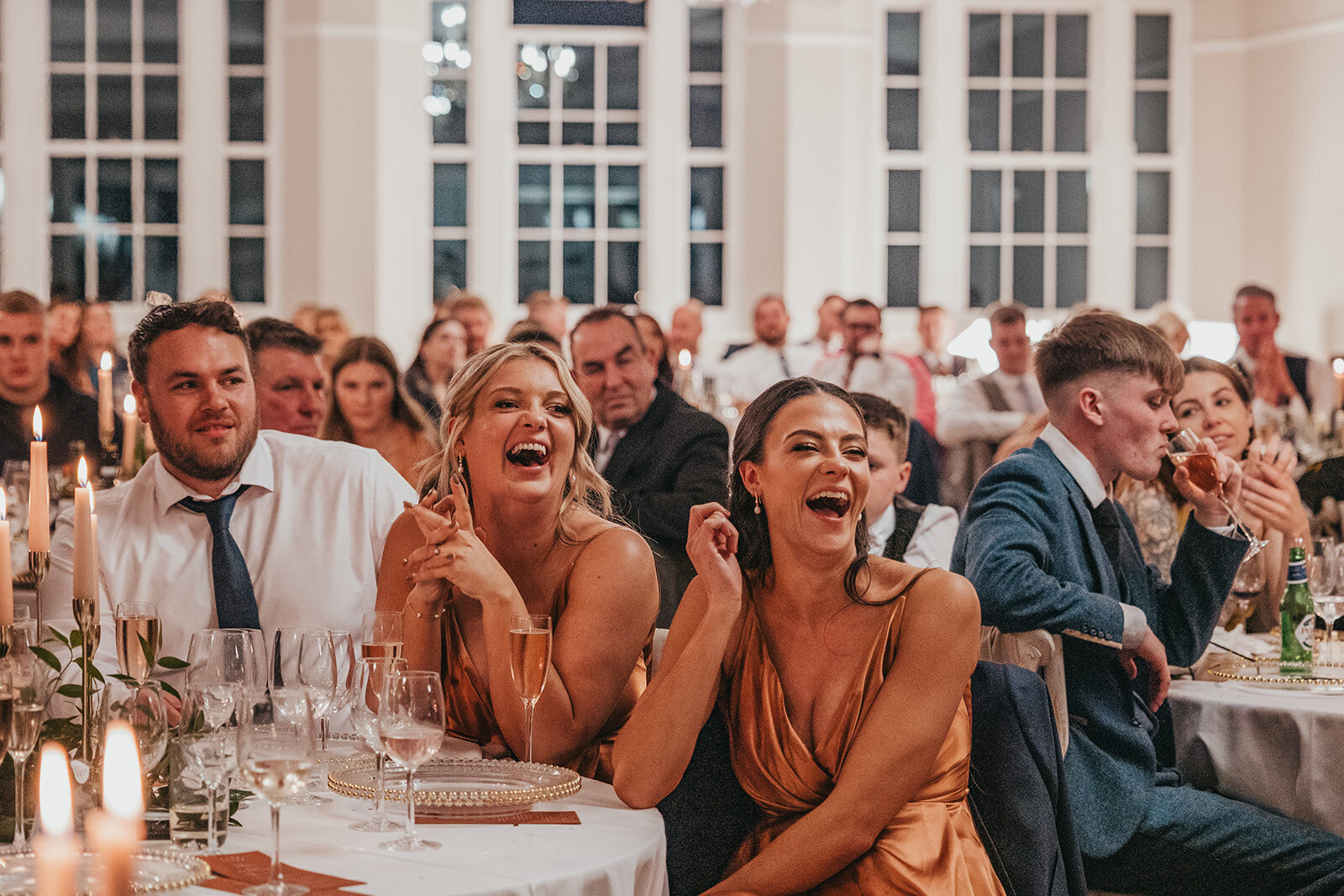 guest's laugh during speeches at wedding