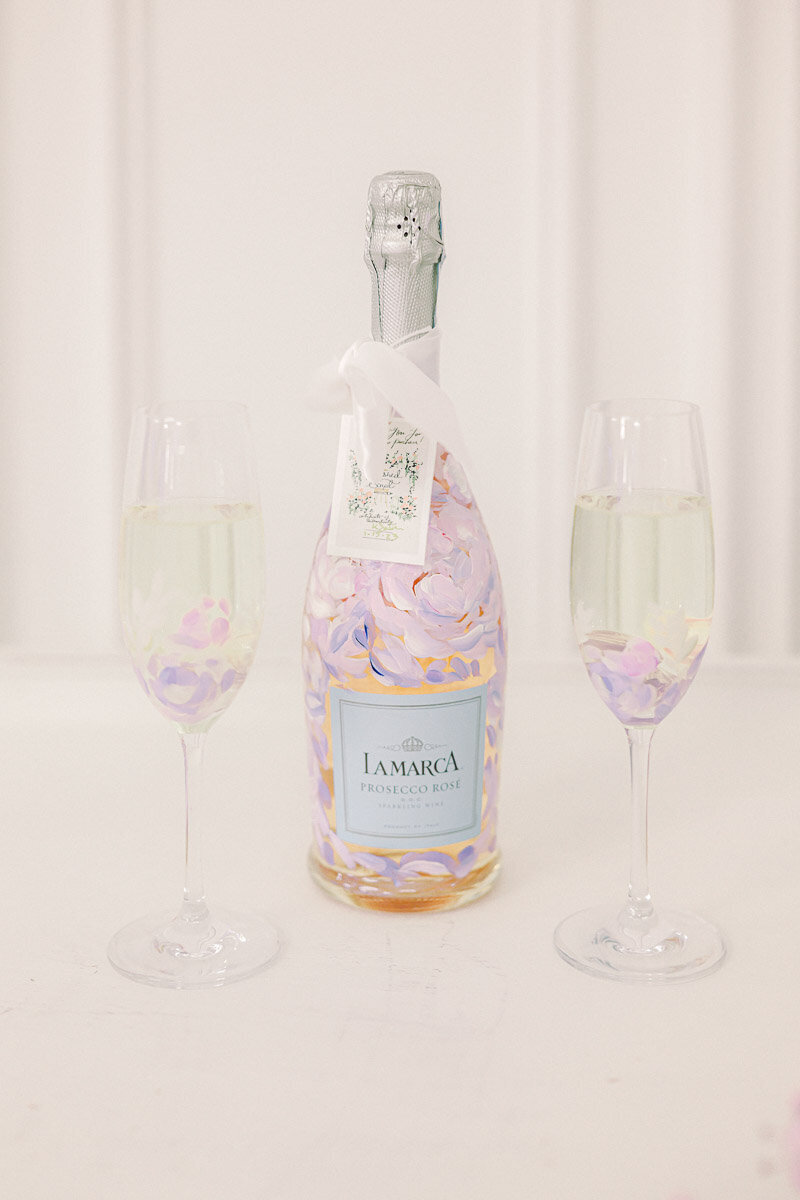 photo of hand painted champagne and glasses