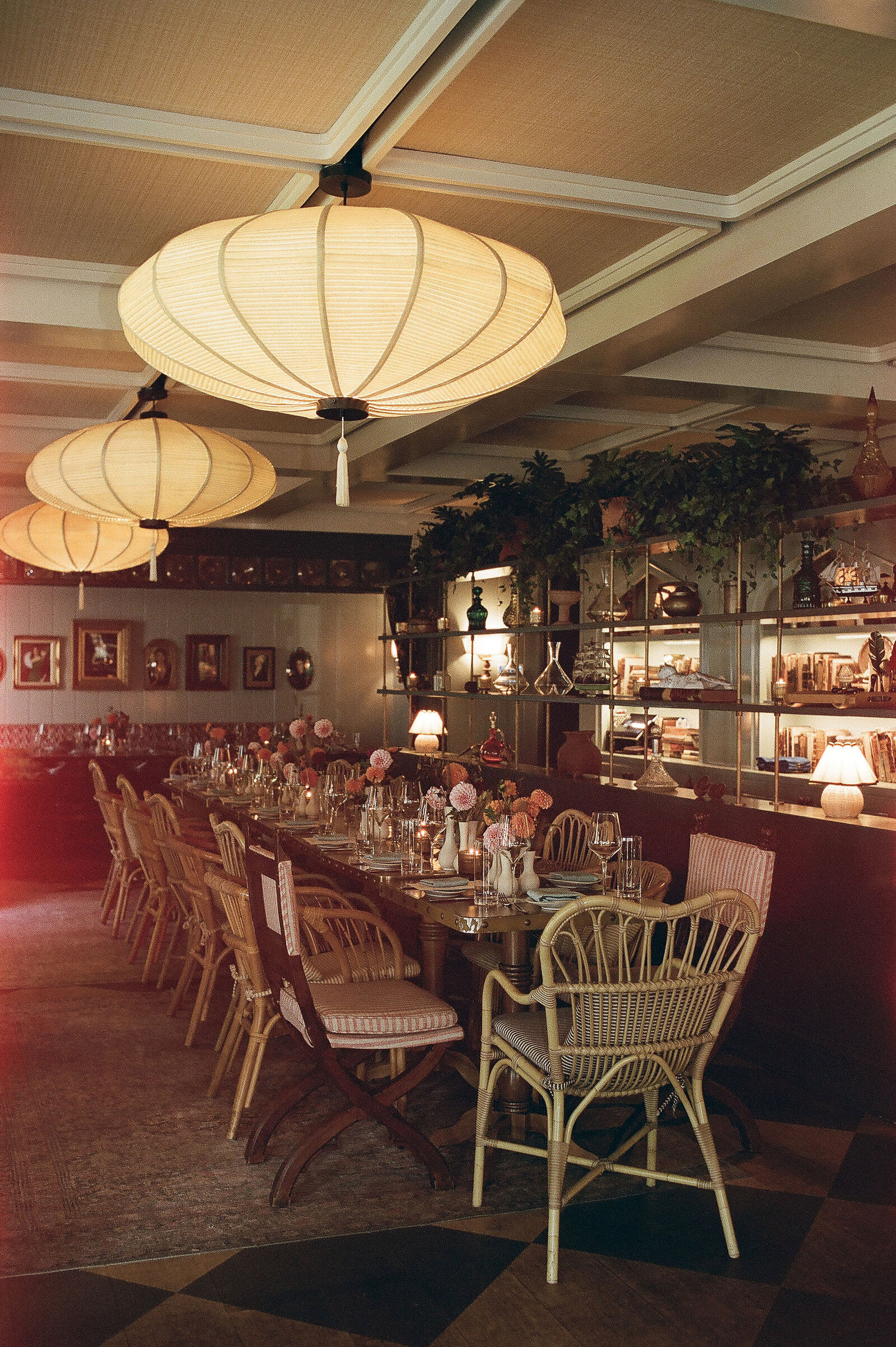 Film photo with slight light leaks of coastal wedding reception table details at Nantucket restaurant Sister Ship 