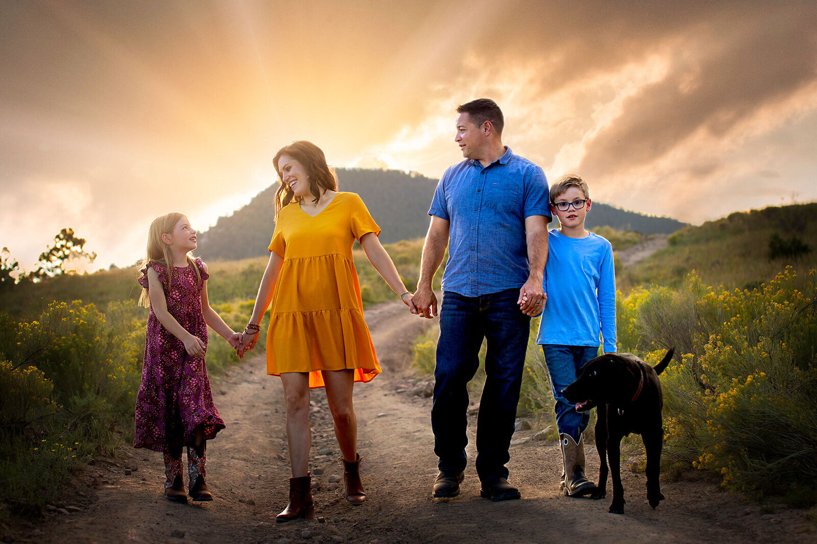 colorado-mountains-mountain-sunset-family-landscape-view-south-forks-Rio-Grande-Club-holding-hands-dog-connection-love