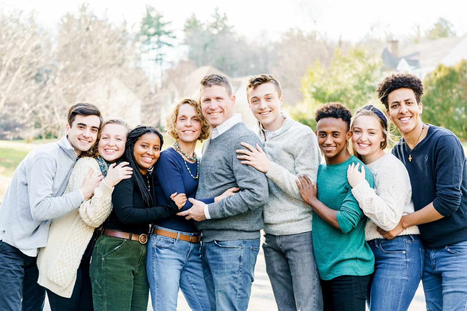 Family smiling for group family portraits