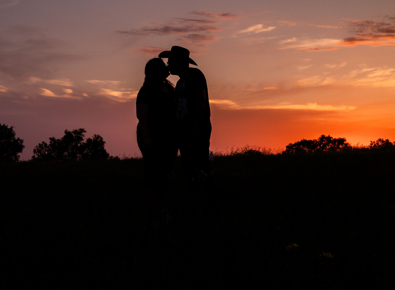 brilliant sunset silhouette of couple