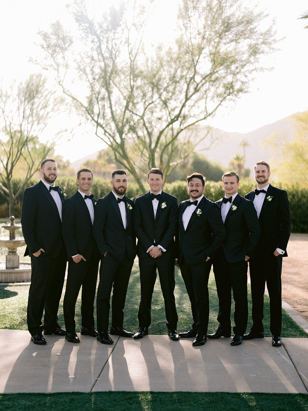 black-suits-groom-groomsmen-bow-ties-florists-phoenix-az