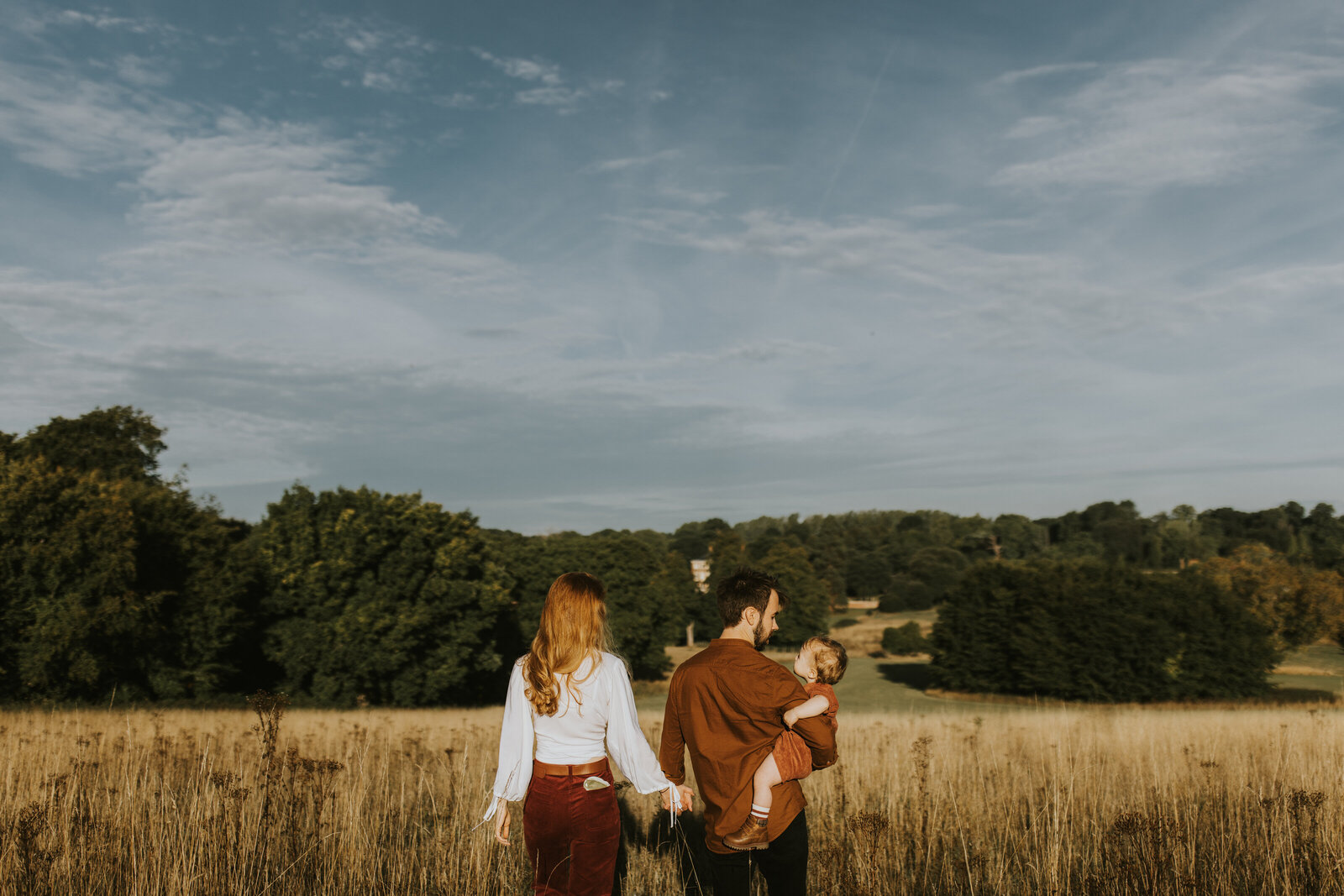 Tom, Beth and their son Toby in a field in Kent