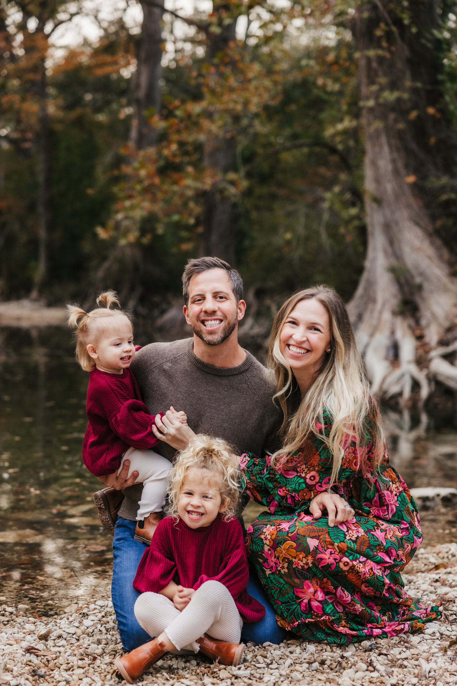 family-smiles-at-camera