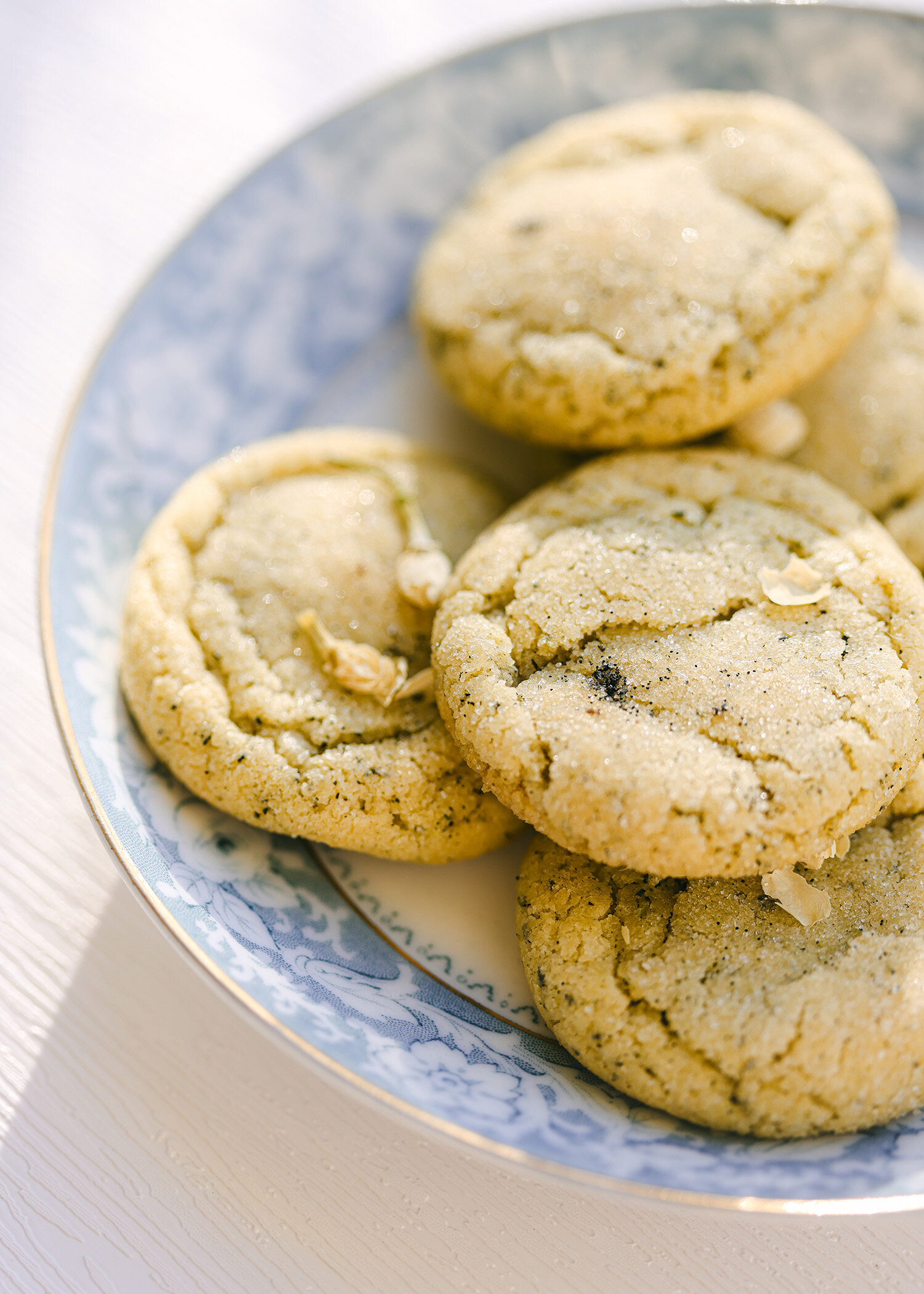 Styled food photography vanilla bean jasmine cookies on tea plate - san diego cookie photographer