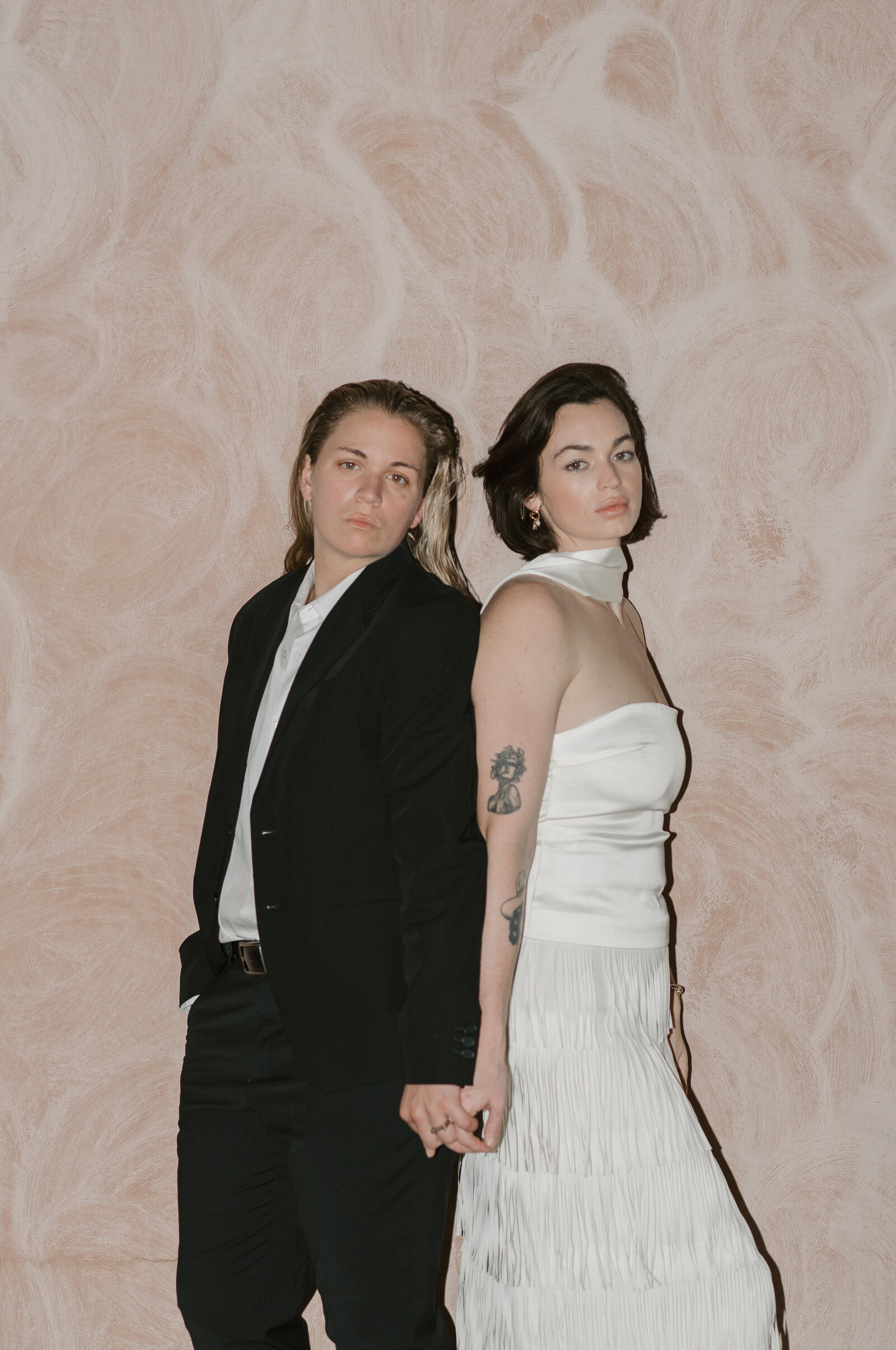 lesbian couple holding hands